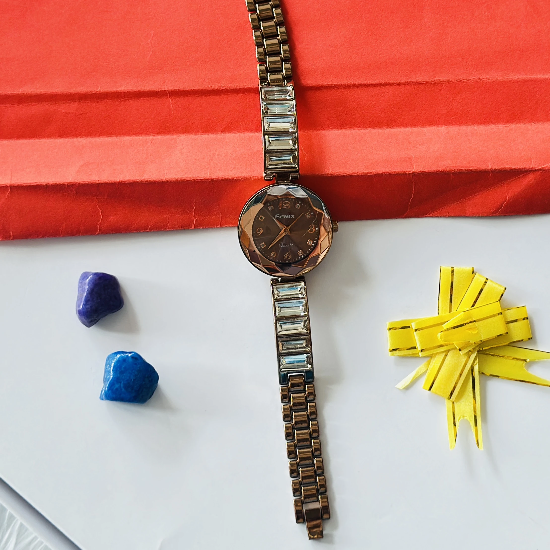 Brown Fenix analog watch for women