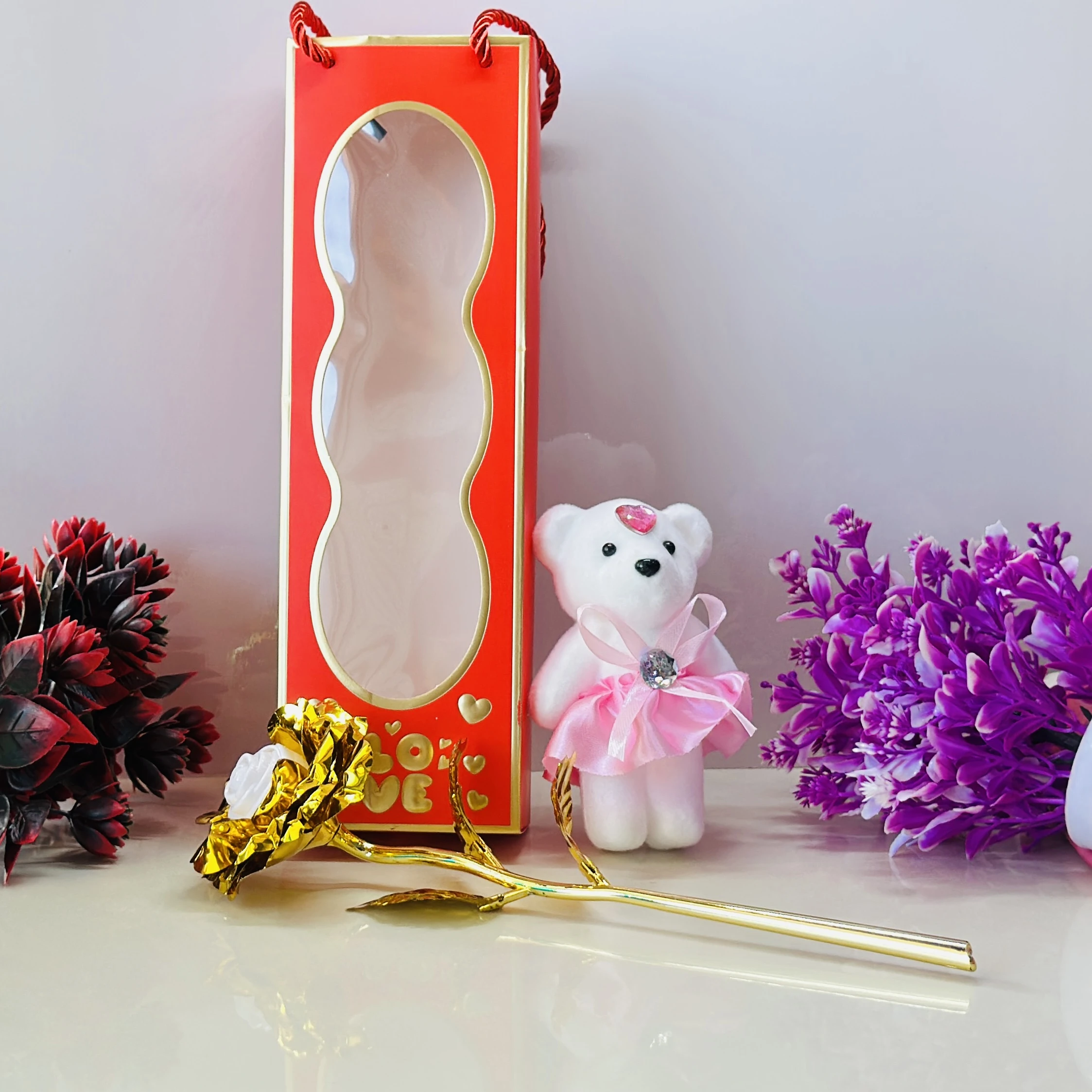 Golden rose and a small teddy bear gift set