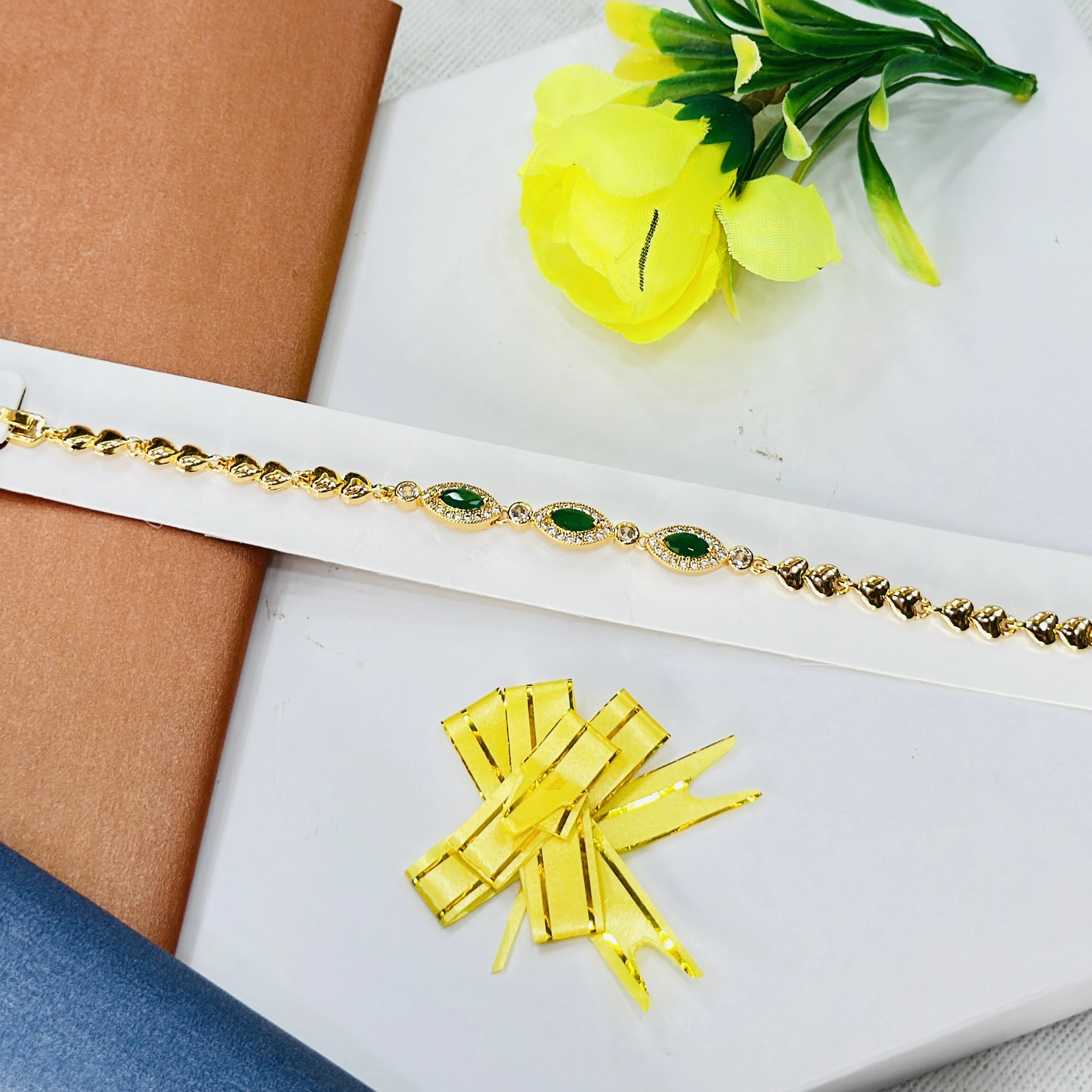 Gold plated, green stone and cubic zirconia embellished bracelet