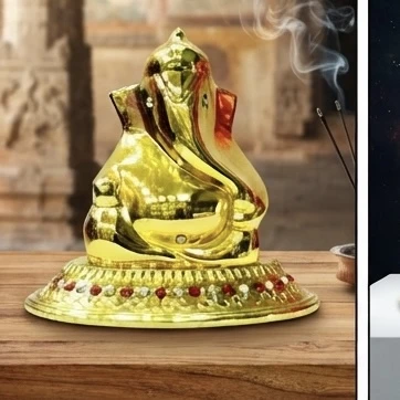 golden metal Lord Ganesha idol for car dashboards