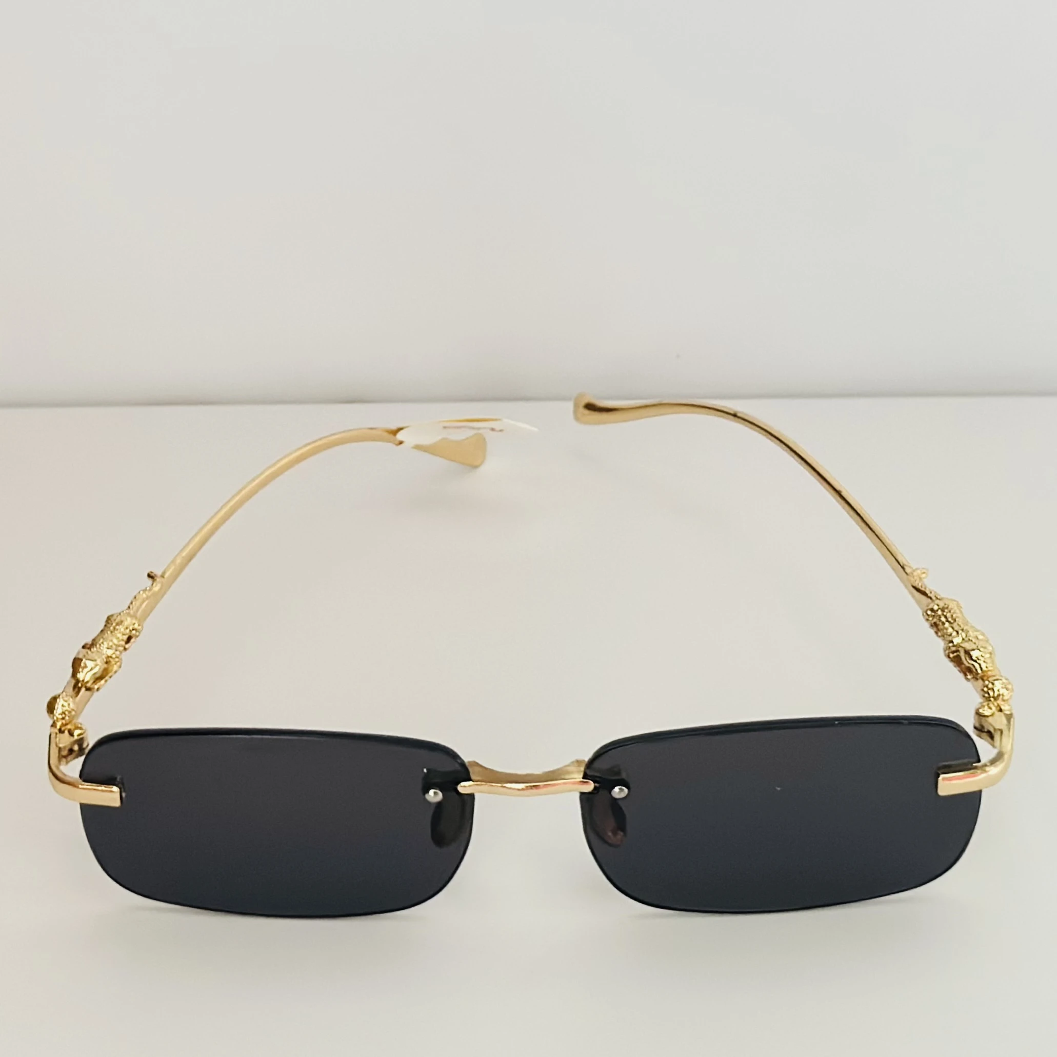 Gucci GG1221S 001 rimless rectangular sunglasses