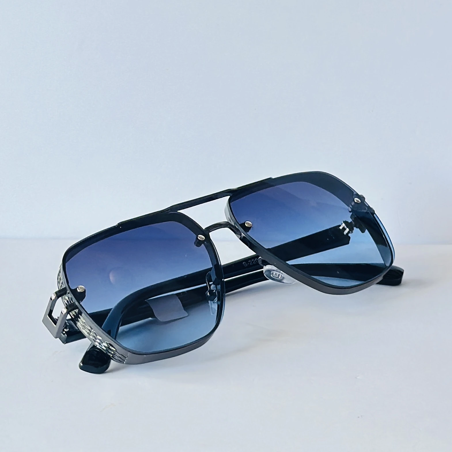 sunglasses appear to be the Maybach
