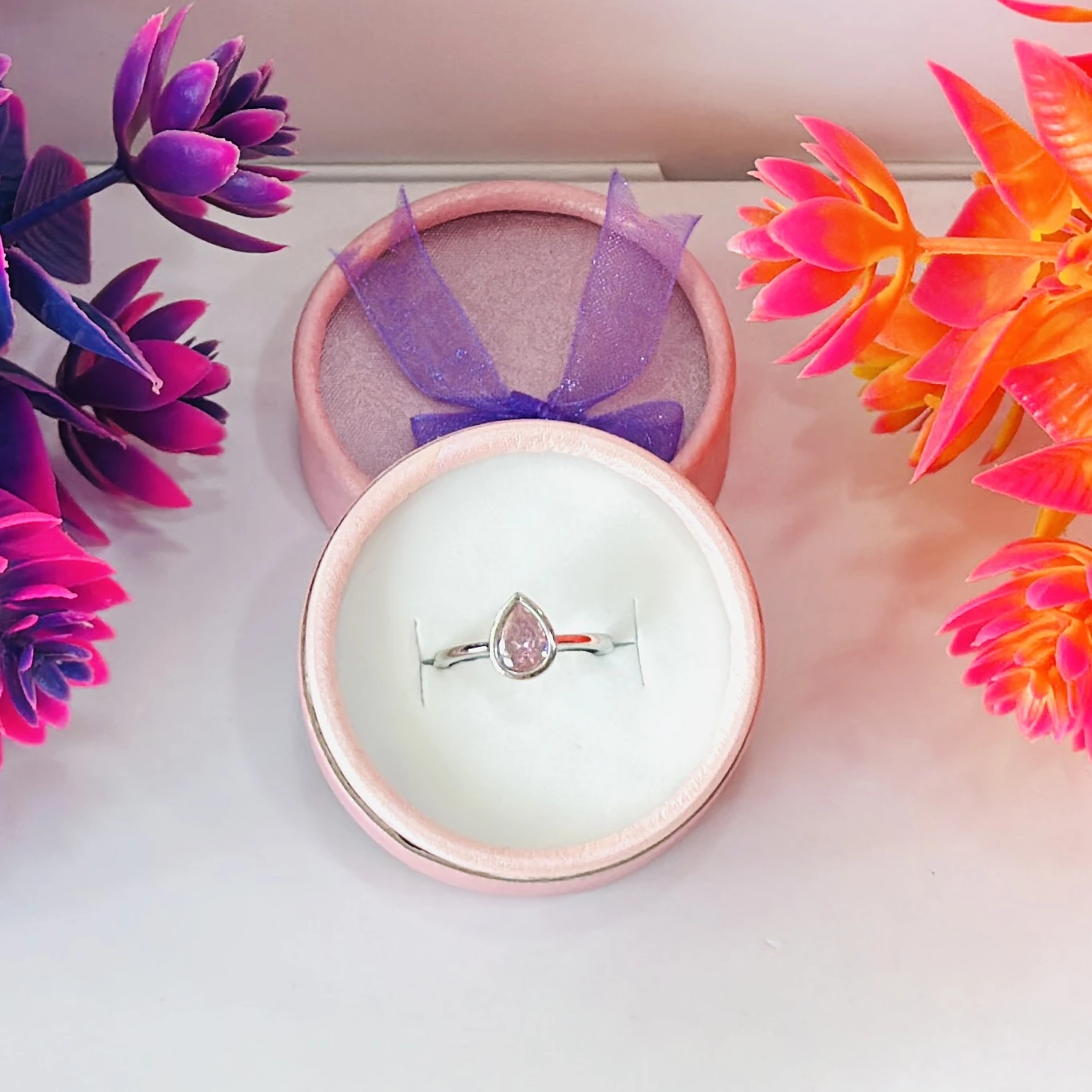 pear-cut pink cubic zirconia or pink sapphire ring