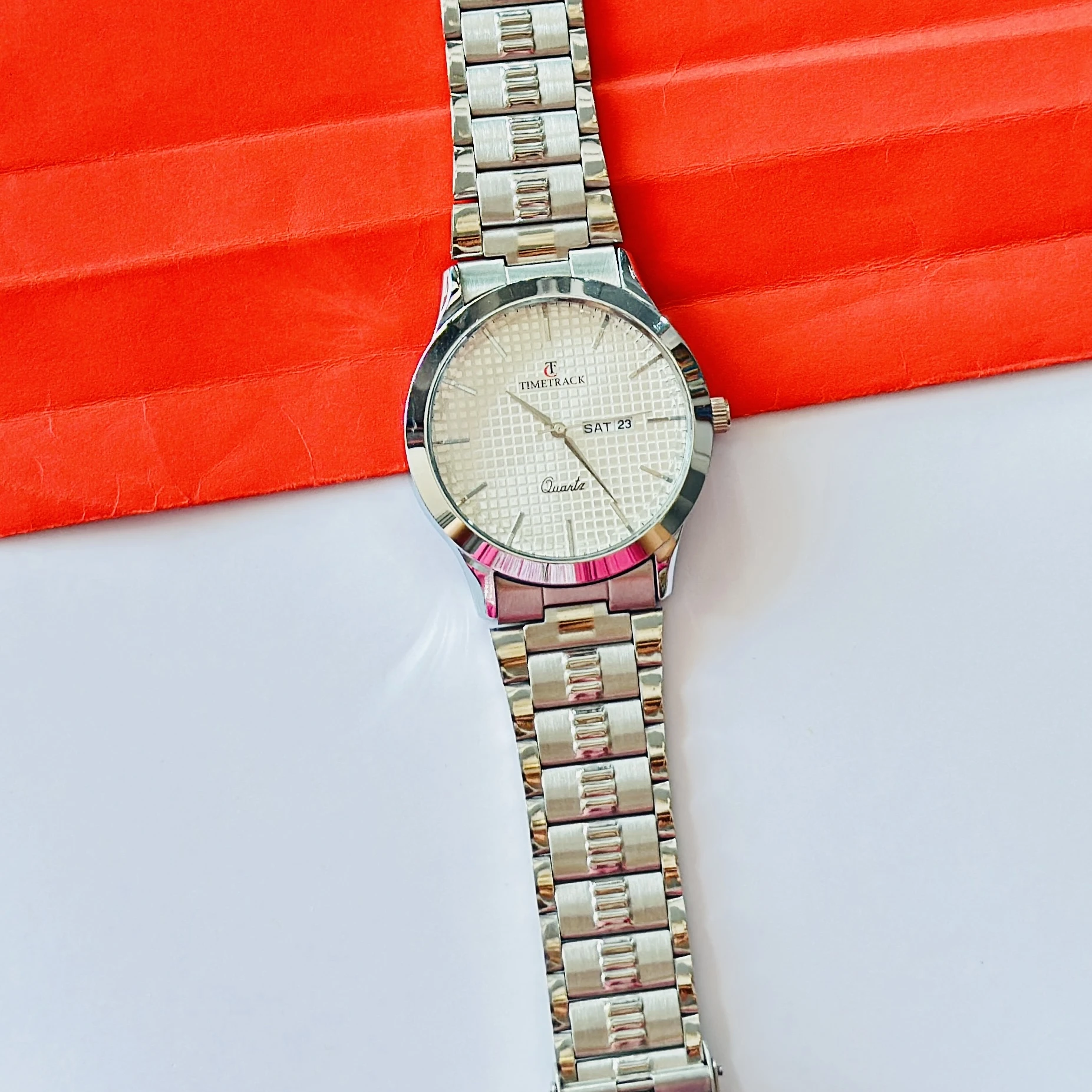 silver-toned stainless steel analogue watch