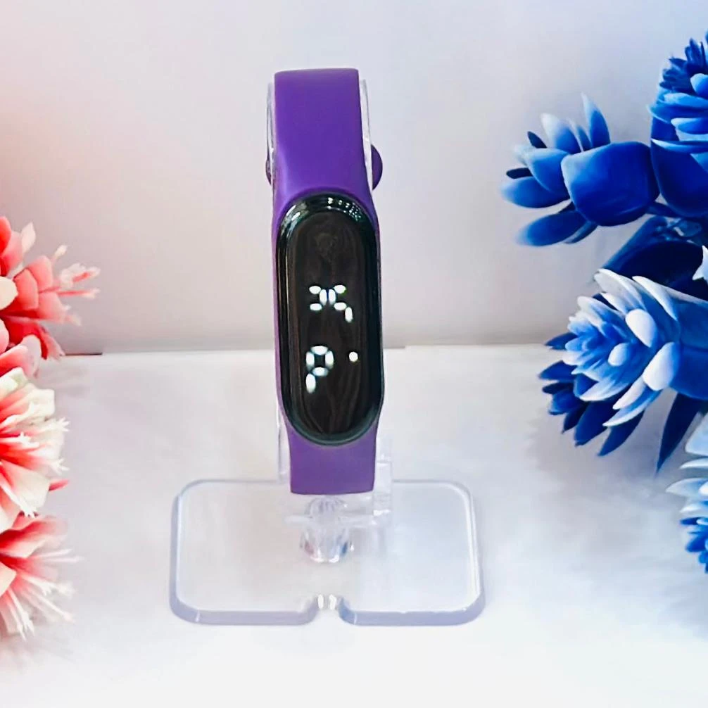 appears to be an Aquarius AQ112 fitness tracker in purple.