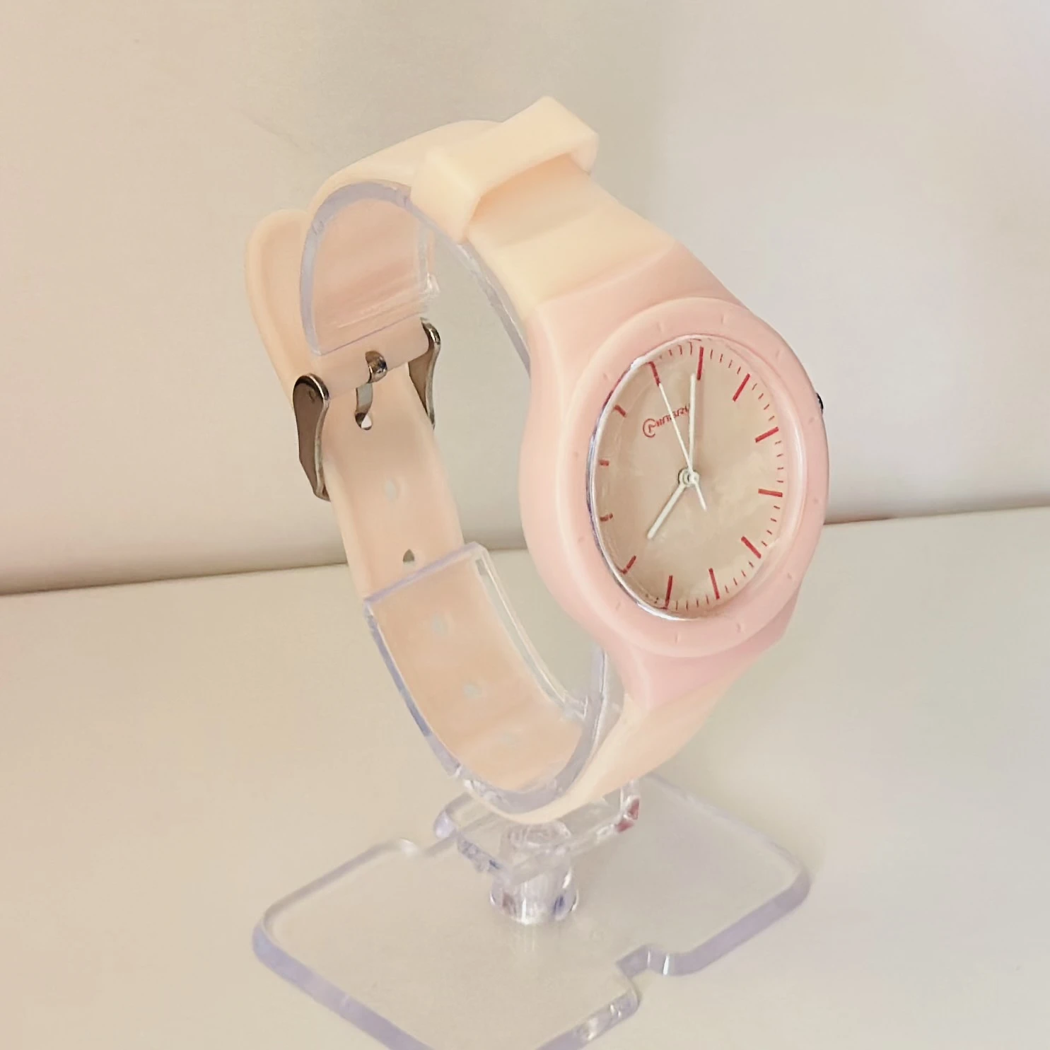 pink Mingrui 8825L quartz wristwatch with a silicone band.