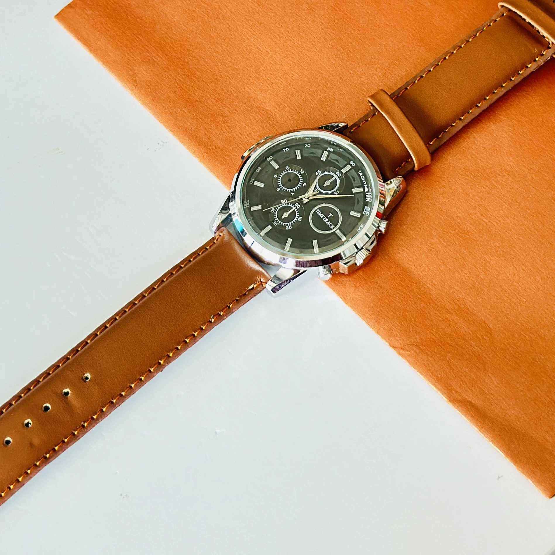 TIMETRACK branded analog watch