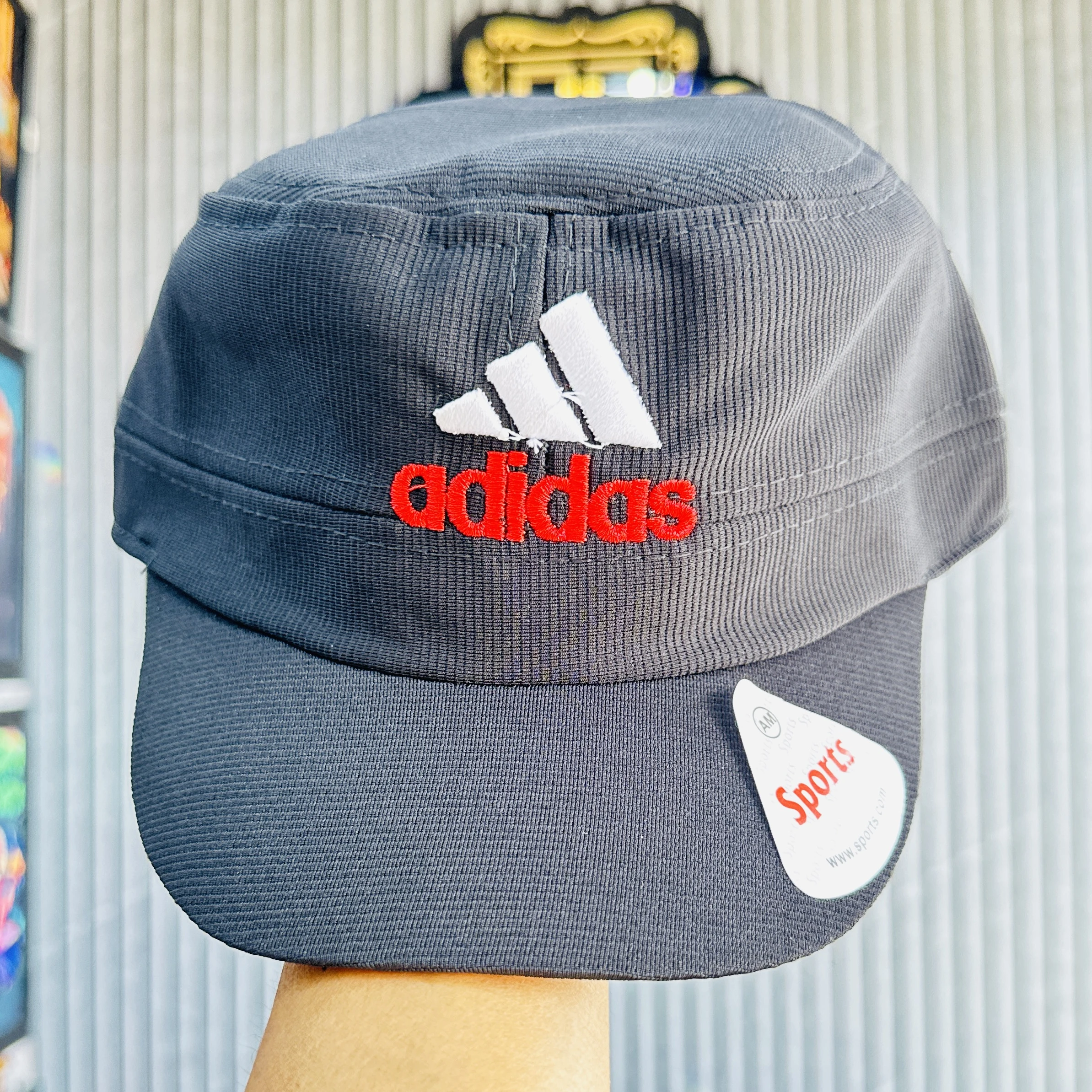 appears to be an Adidas brand sports cap