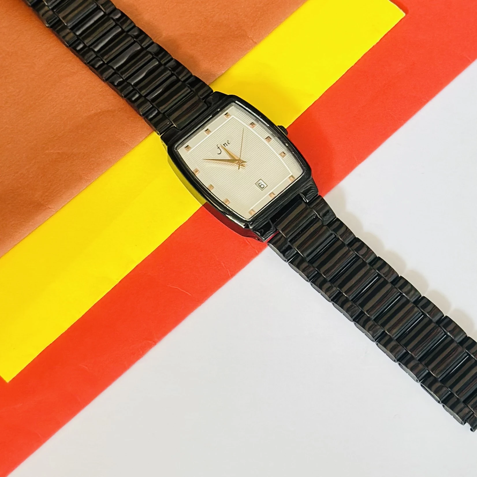 Edge analog watch for men with a rectangular black dial and a black stainless steel strap.