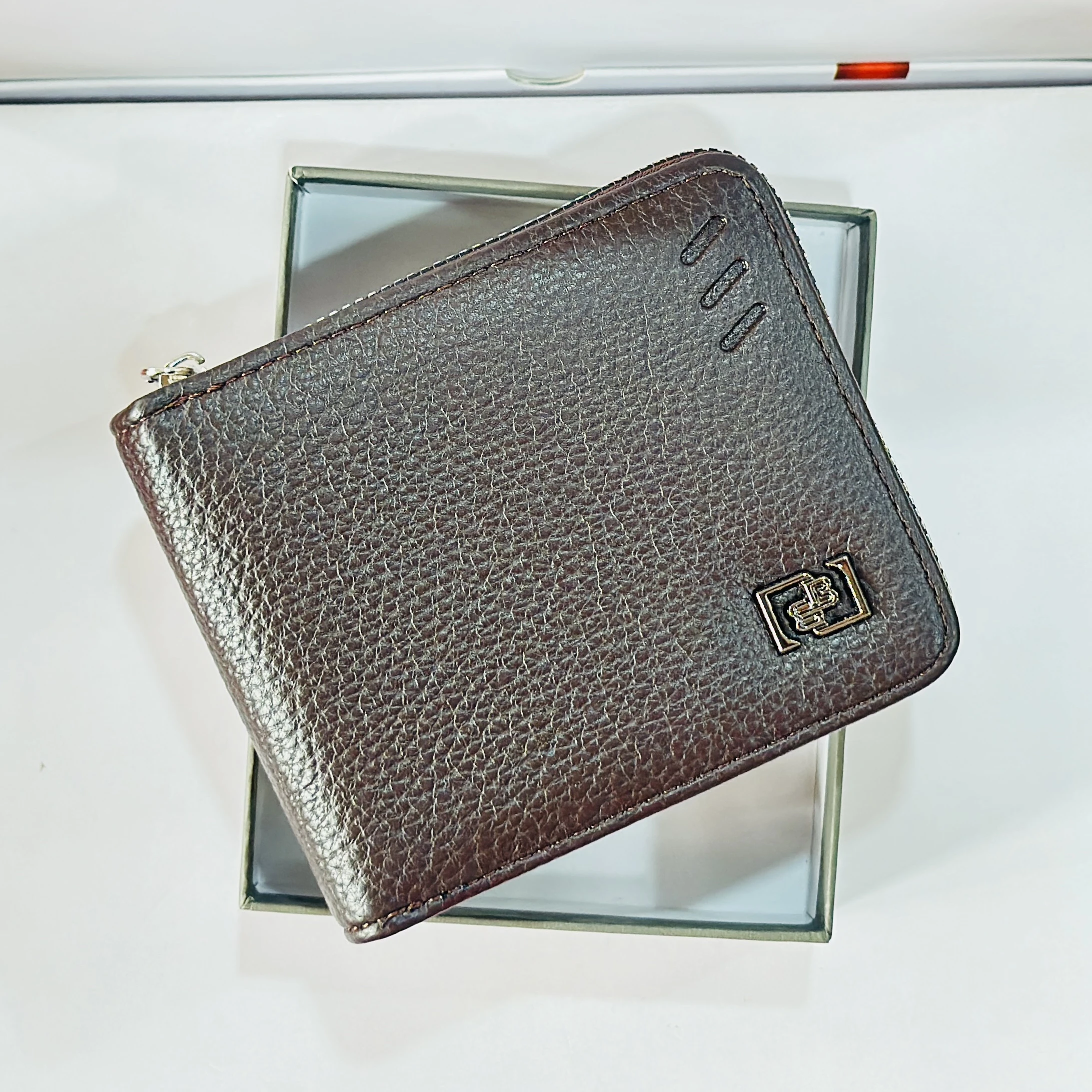 Brown leather, zipped, bi-fold wallet