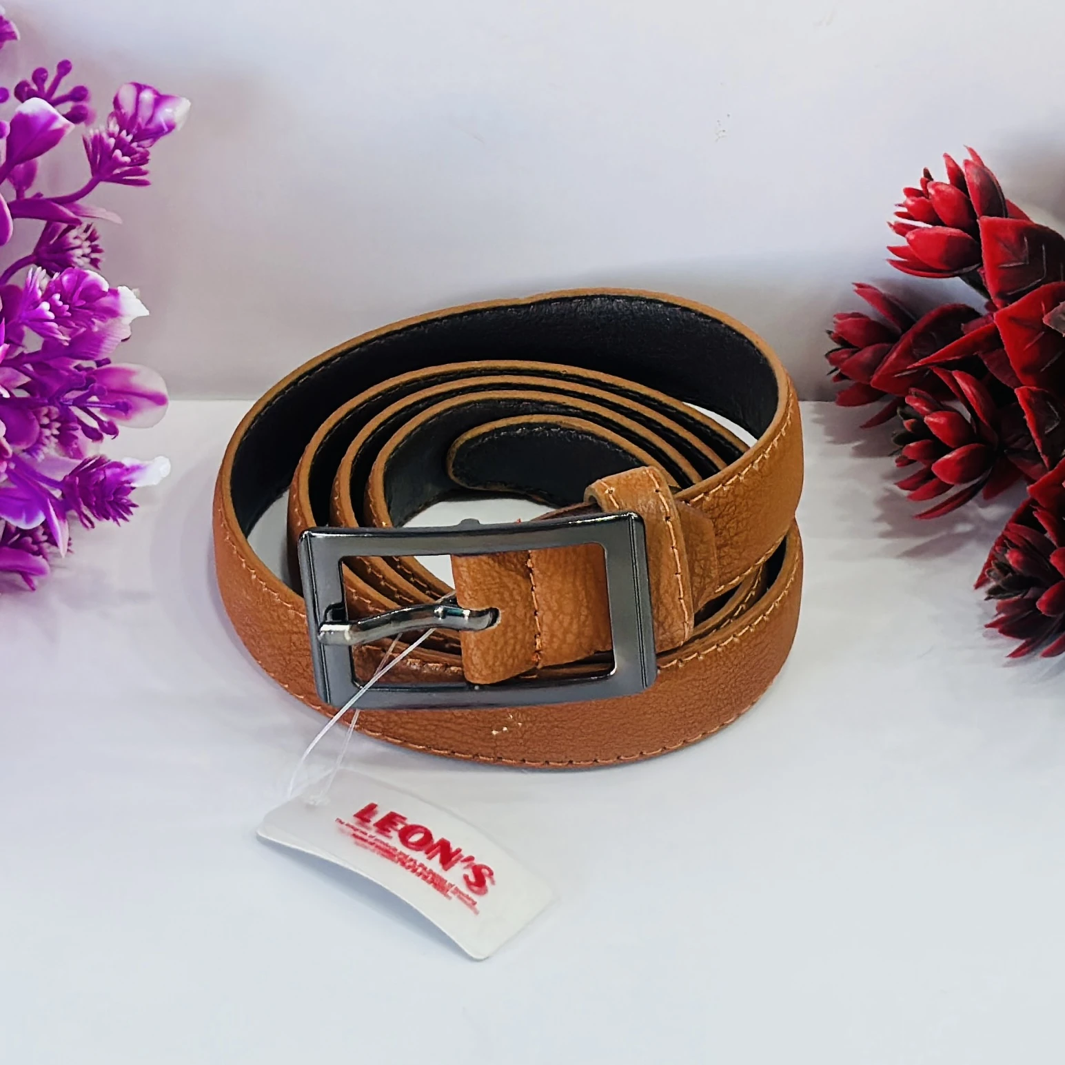 men's tan leather or synthetic leather belt