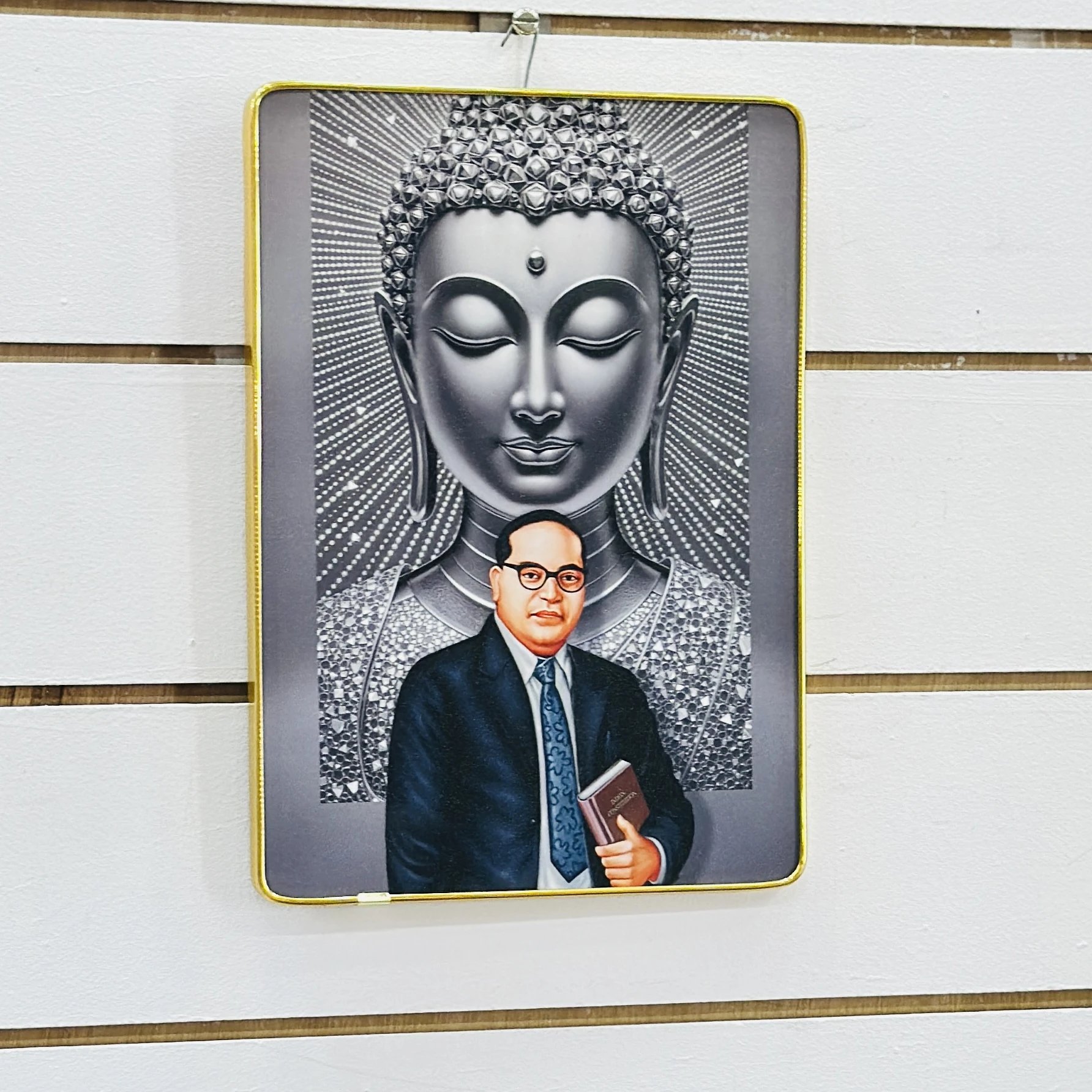 Dr. B.R. Ambedkar with a backdrop of a Buddha statue……ZKQXCX