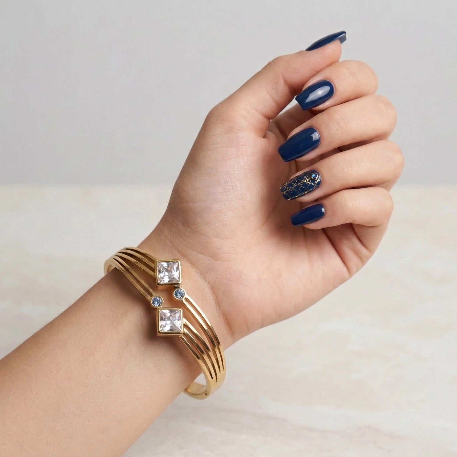 Gold toned multi-strand cuff bracelet