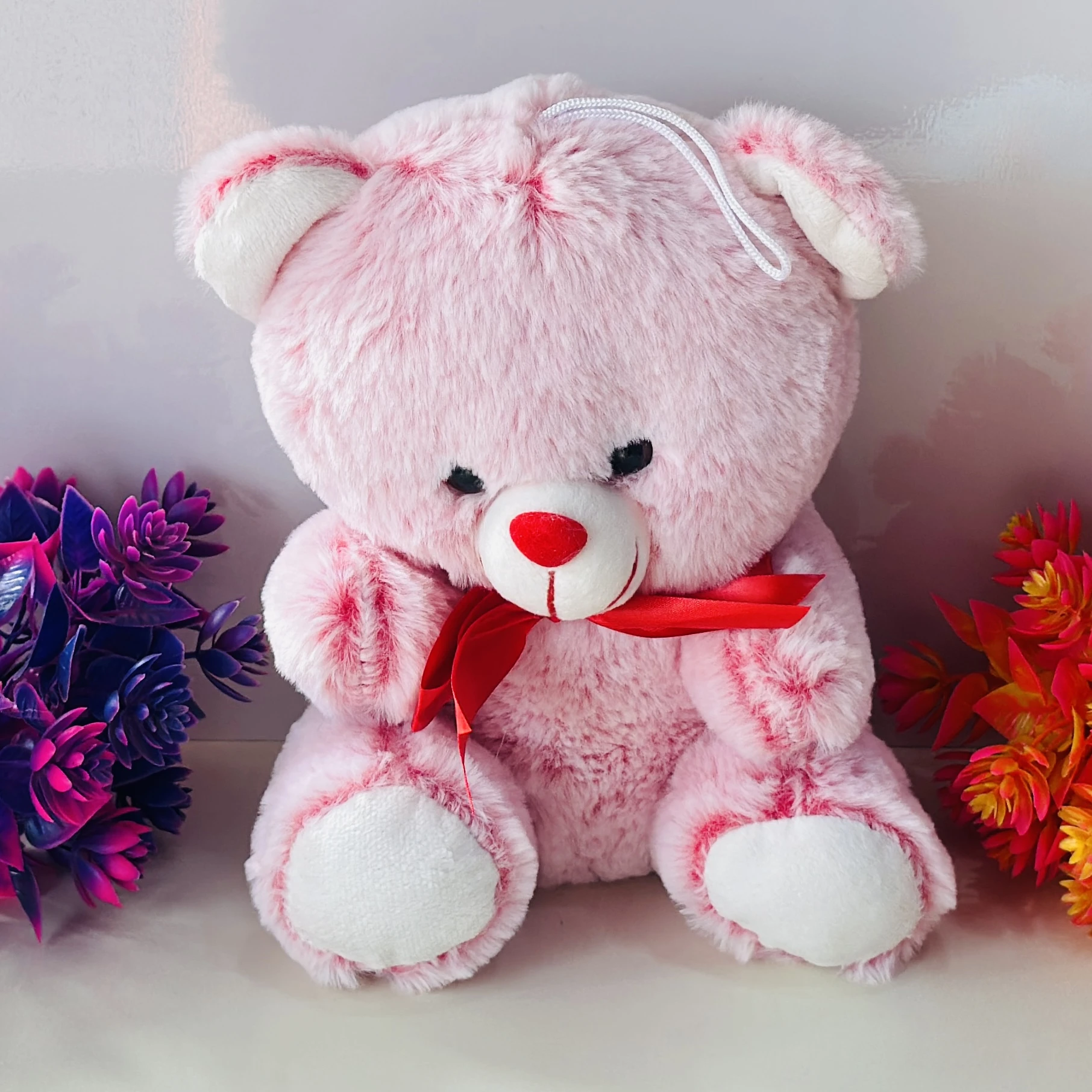 pink teddy bear soft toy.