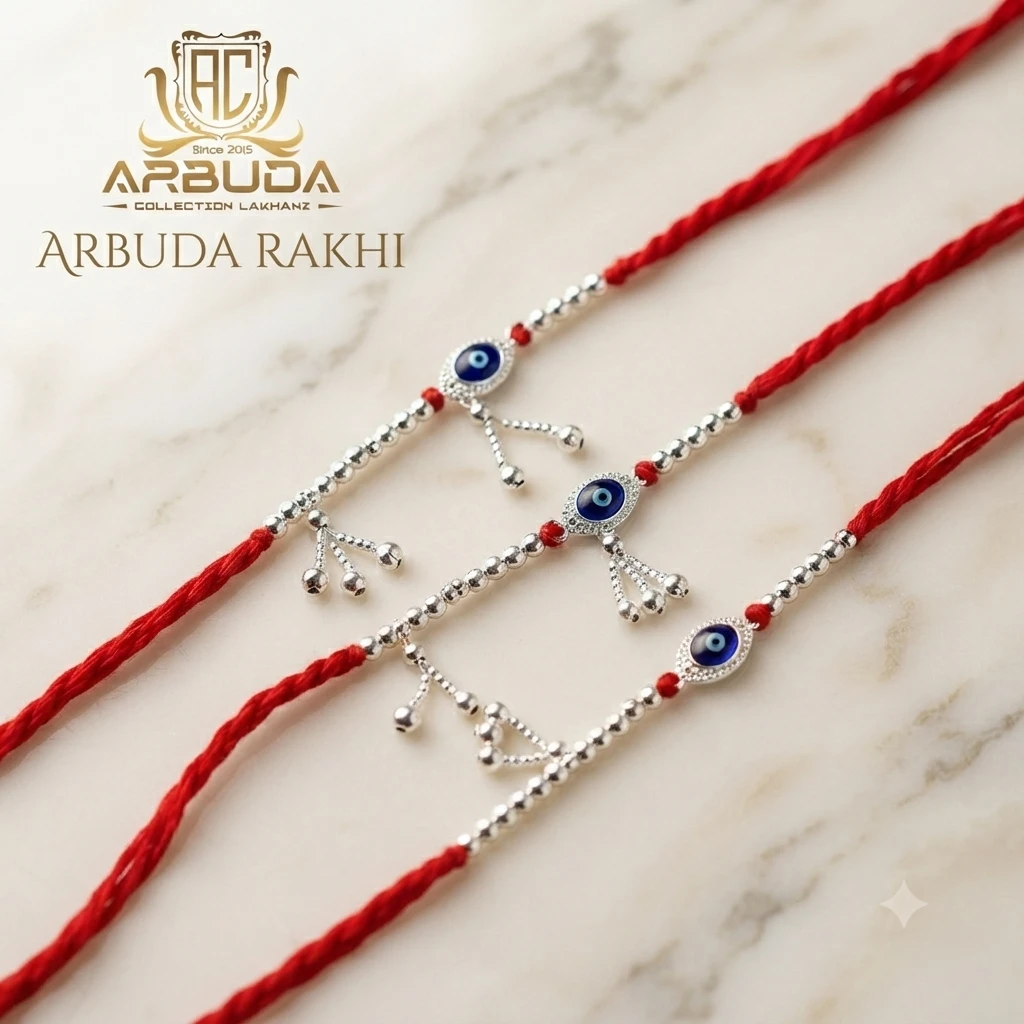 Rakhis featuring silver-toned evil eye charms and small hanging beads.