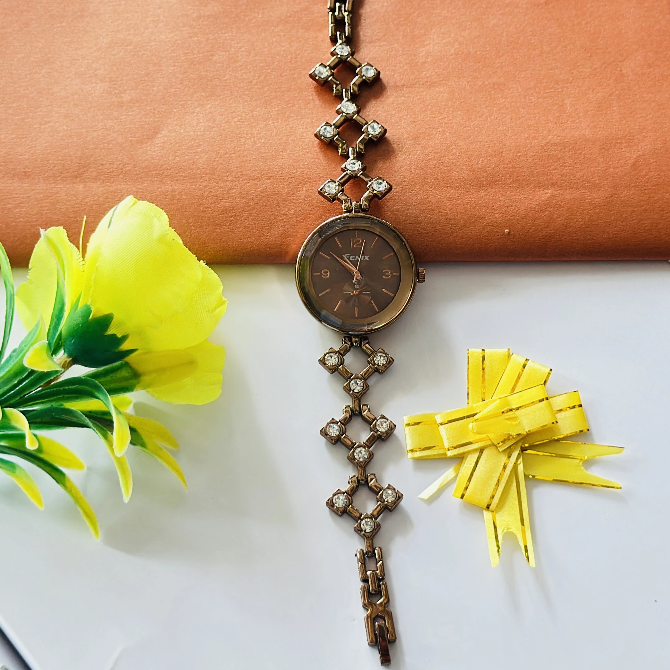 Brown bracelet-style women's watch