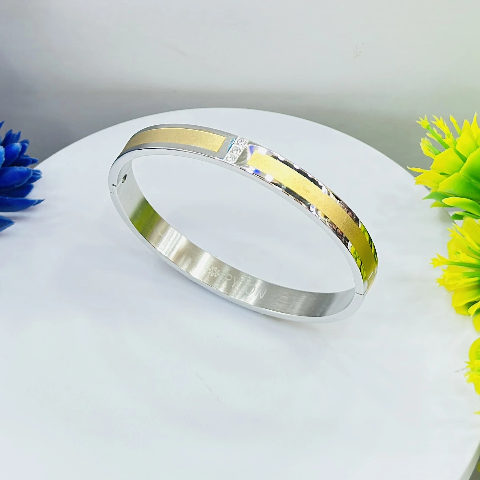 stylish two-tone kada is a stainless steel bracelet