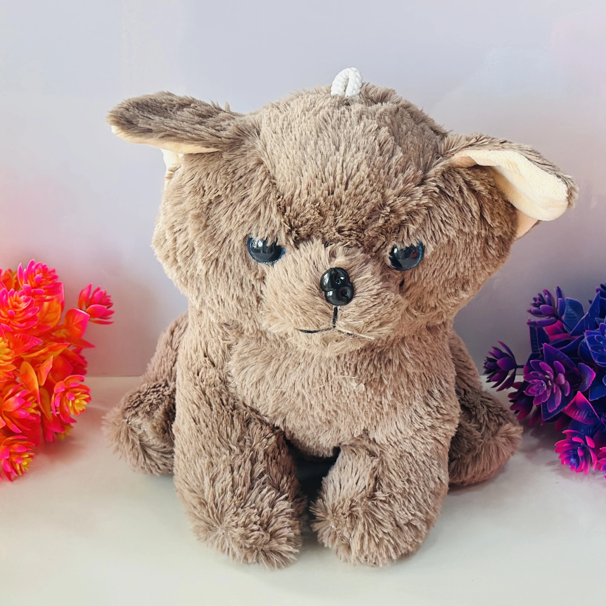 Brown fuzzy dog soft toy