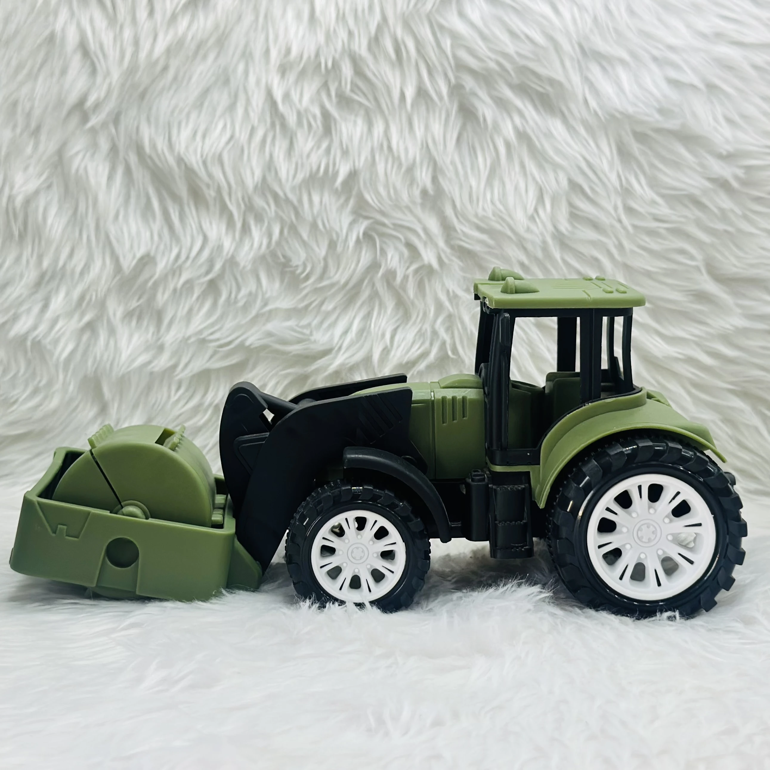 friction-powered road roller toy truck.