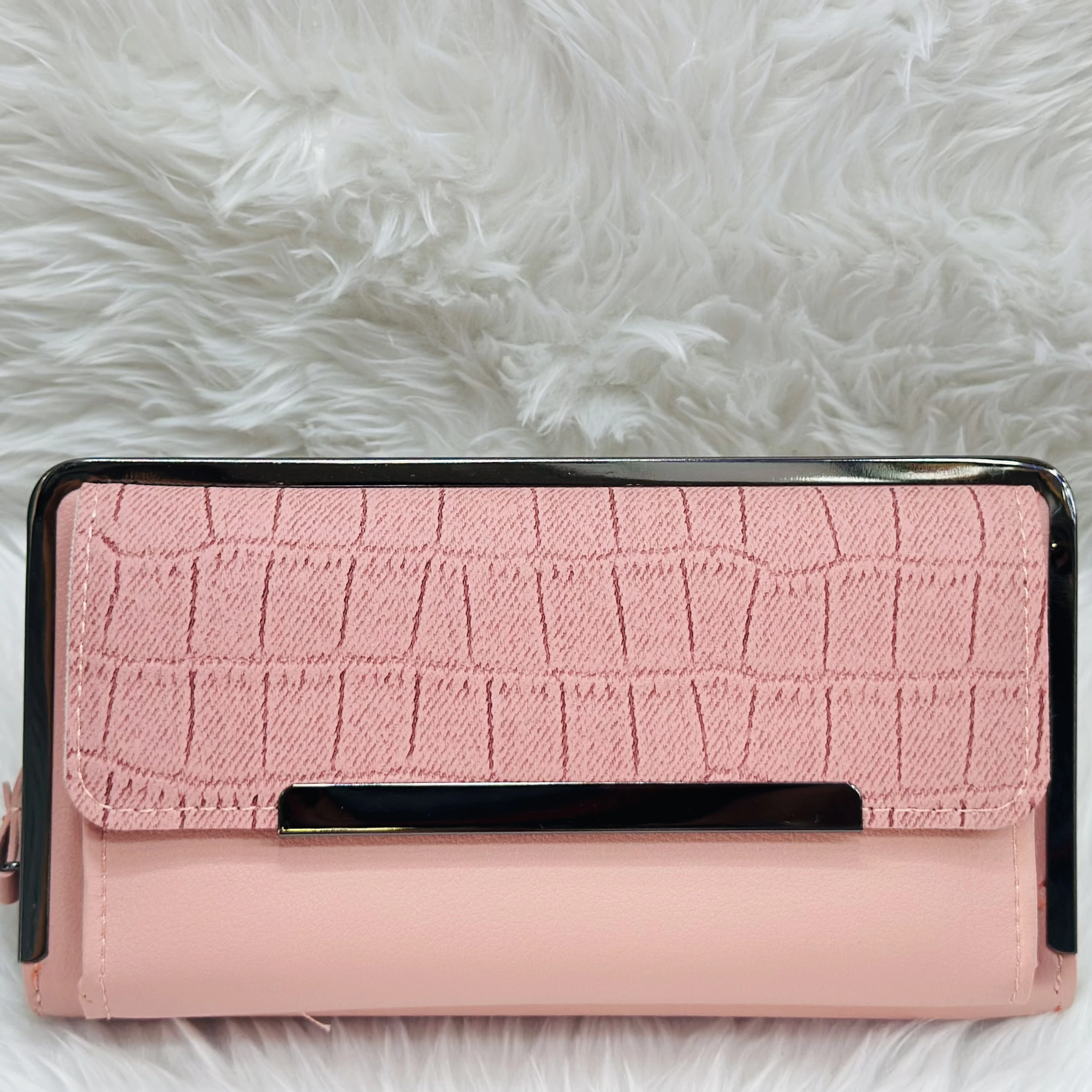 Brisfine pink clutch wallet in polyurethane outer material.
