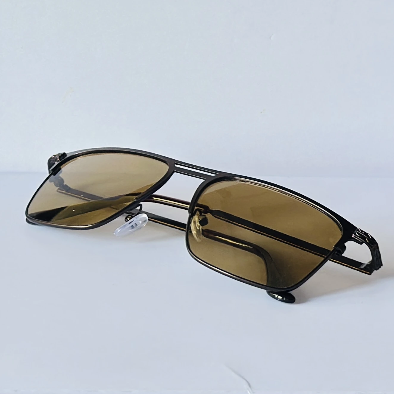 sunglasses appear to be the Vincent Chase