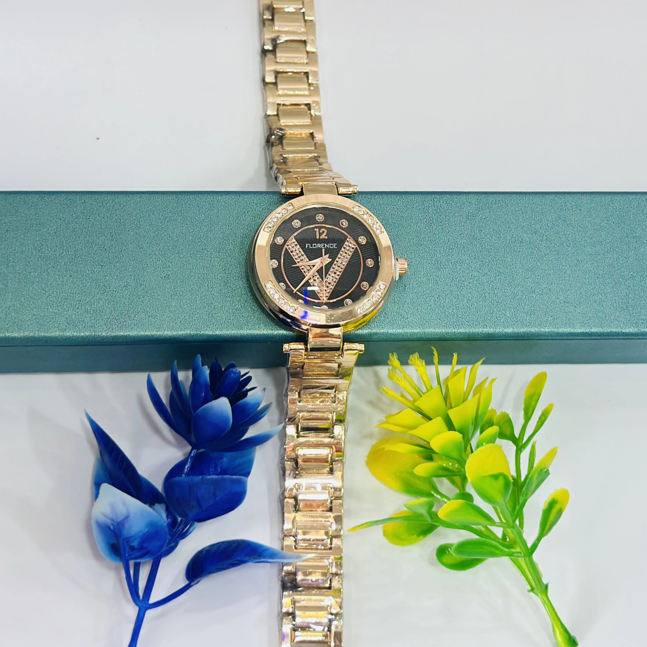 Analogue Women's Wrist Watch in rose gold color.