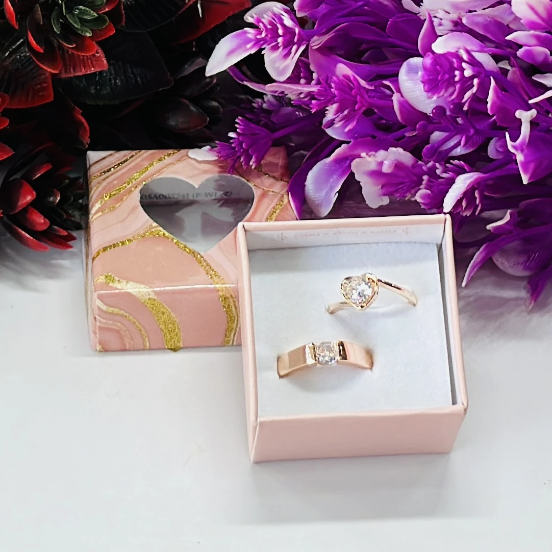 Jewel wedding wear couple rings made of 18 karat rose gold.