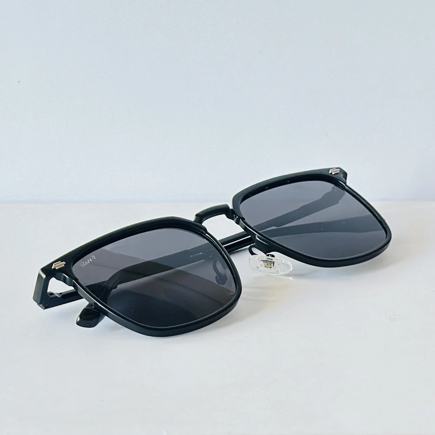 RAw-7 sunglasses feature a sleek black full-rim rectangle frame