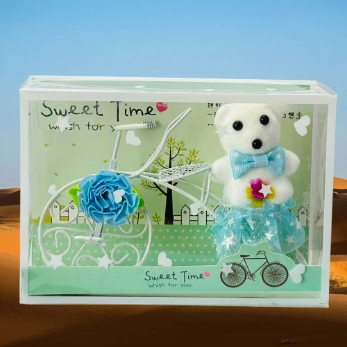 White Plastic Cycle with Teddy Bear and Rose Petals Gift Box