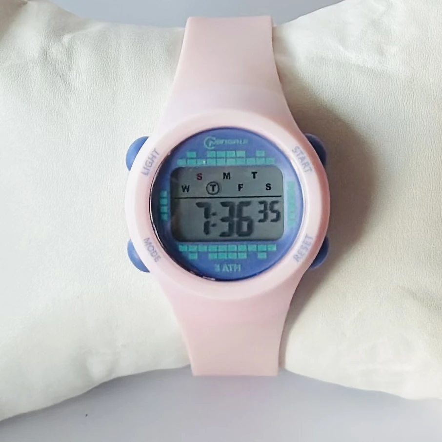 Mingrui 8212L Tennger Lady sport digital watch with a pink silicone strap.