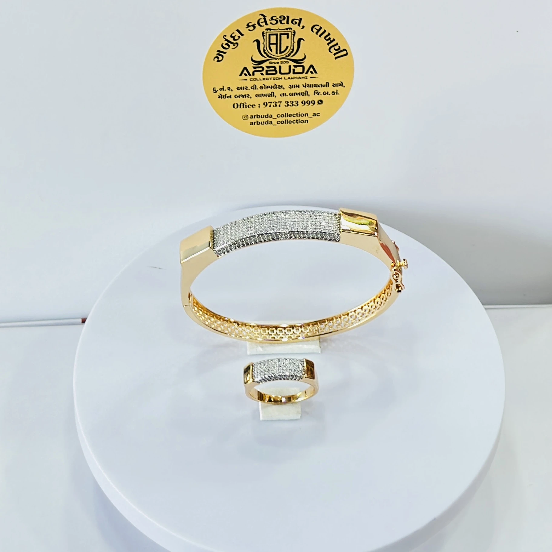Gold toned Kada  and ring set