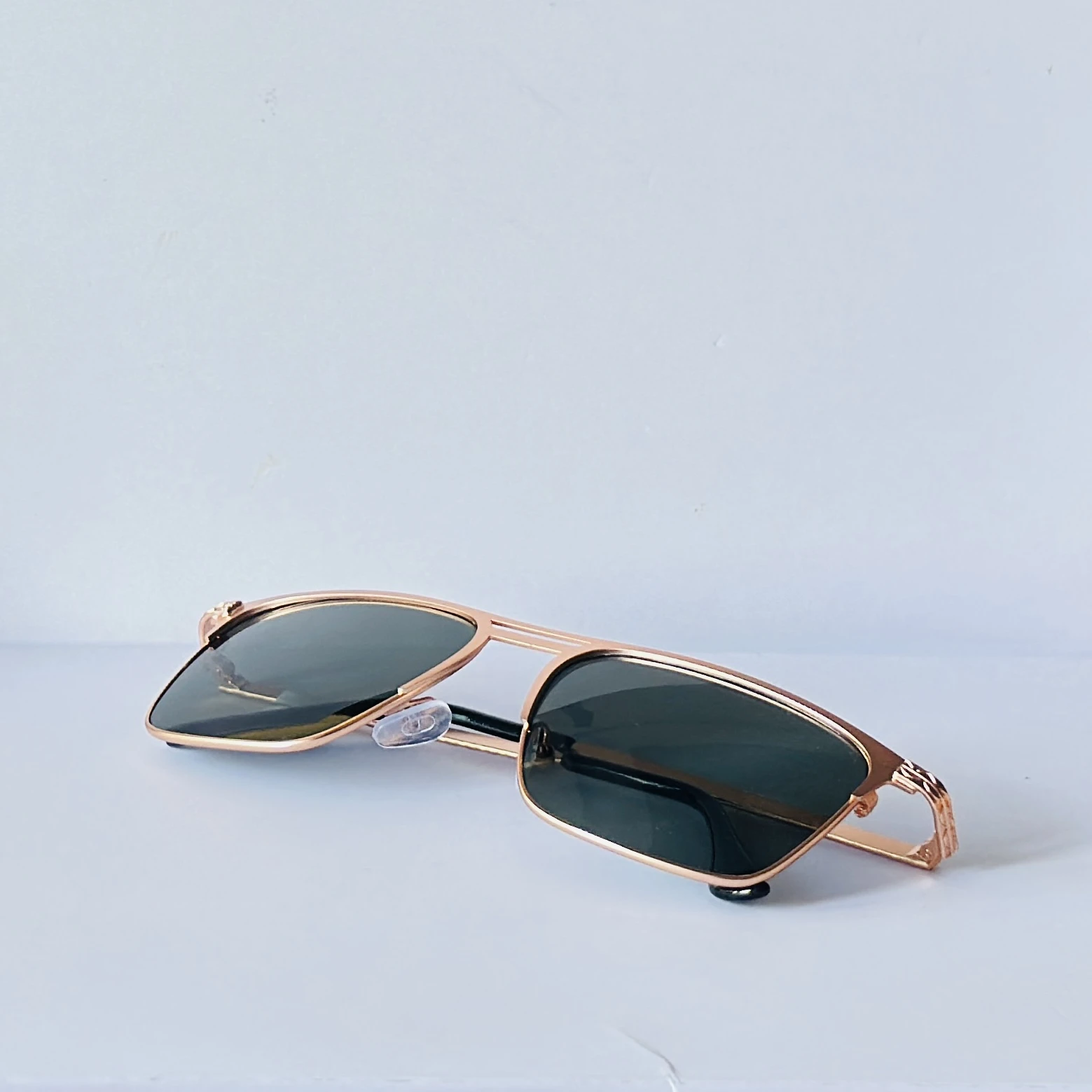 sunglasses appear to be the Vincent Chase