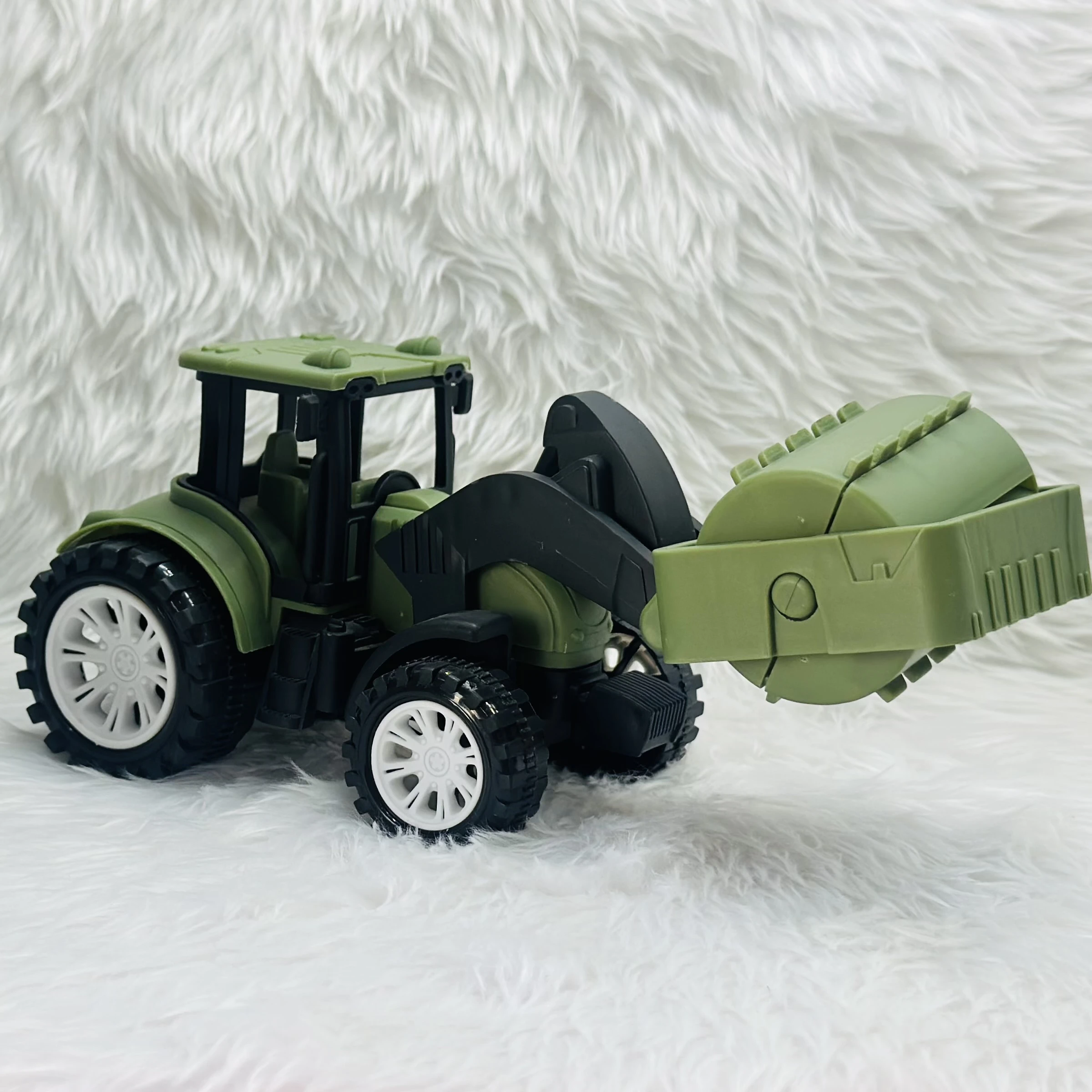 friction-powered road roller toy truck.