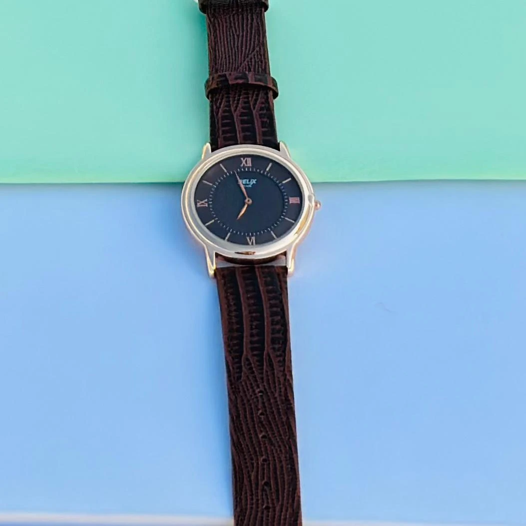 Brown analog watch For man’s