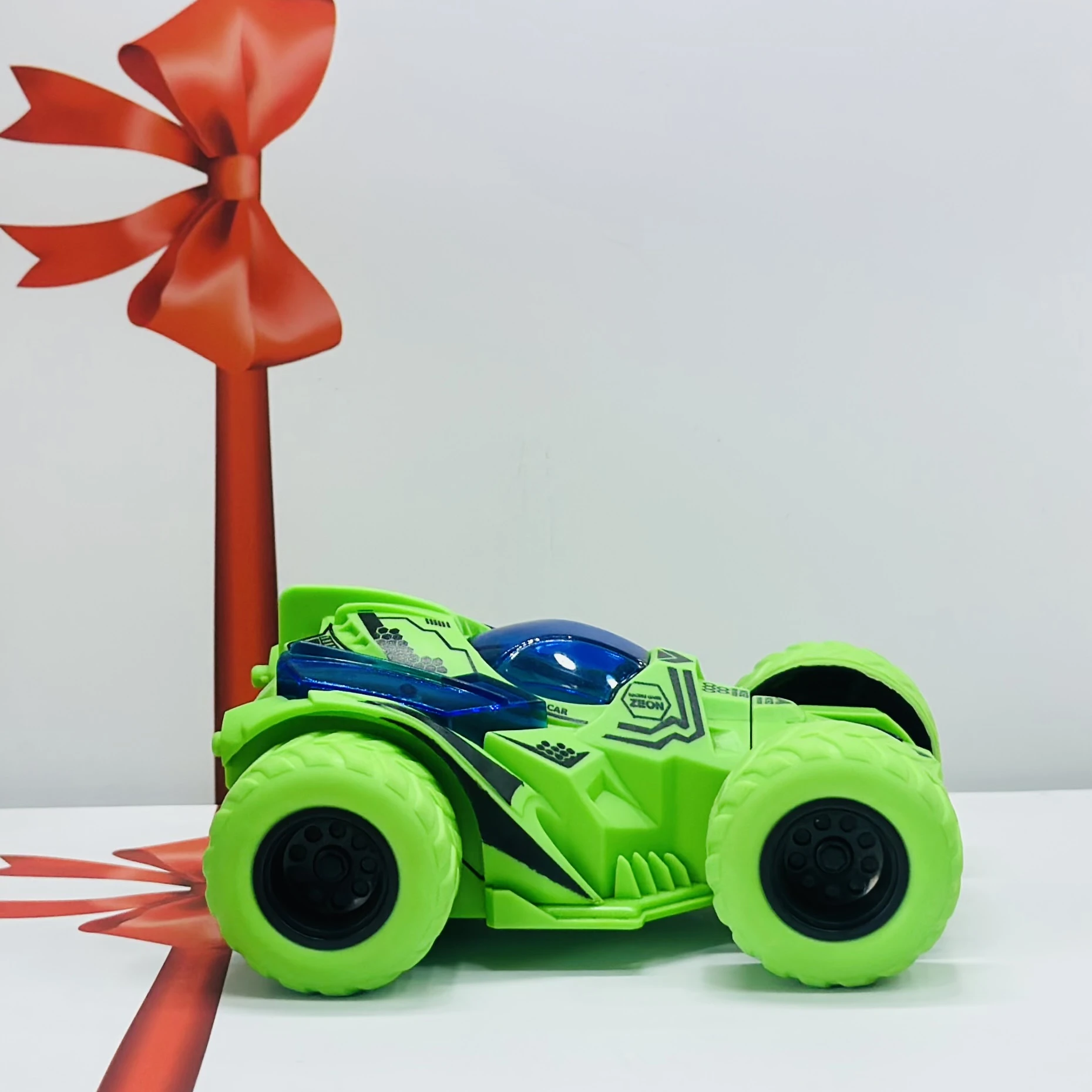 friction-powered toy stunt car