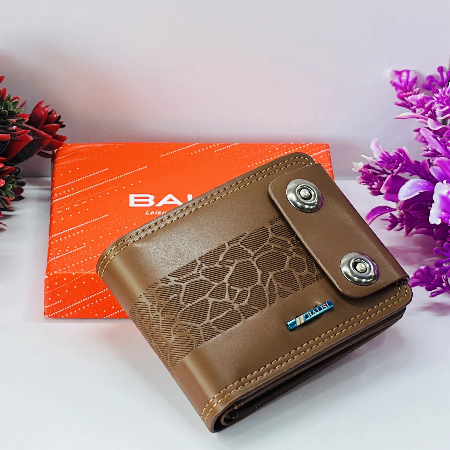 brown men's BALISI wallet with a textured pattern and snap closure.