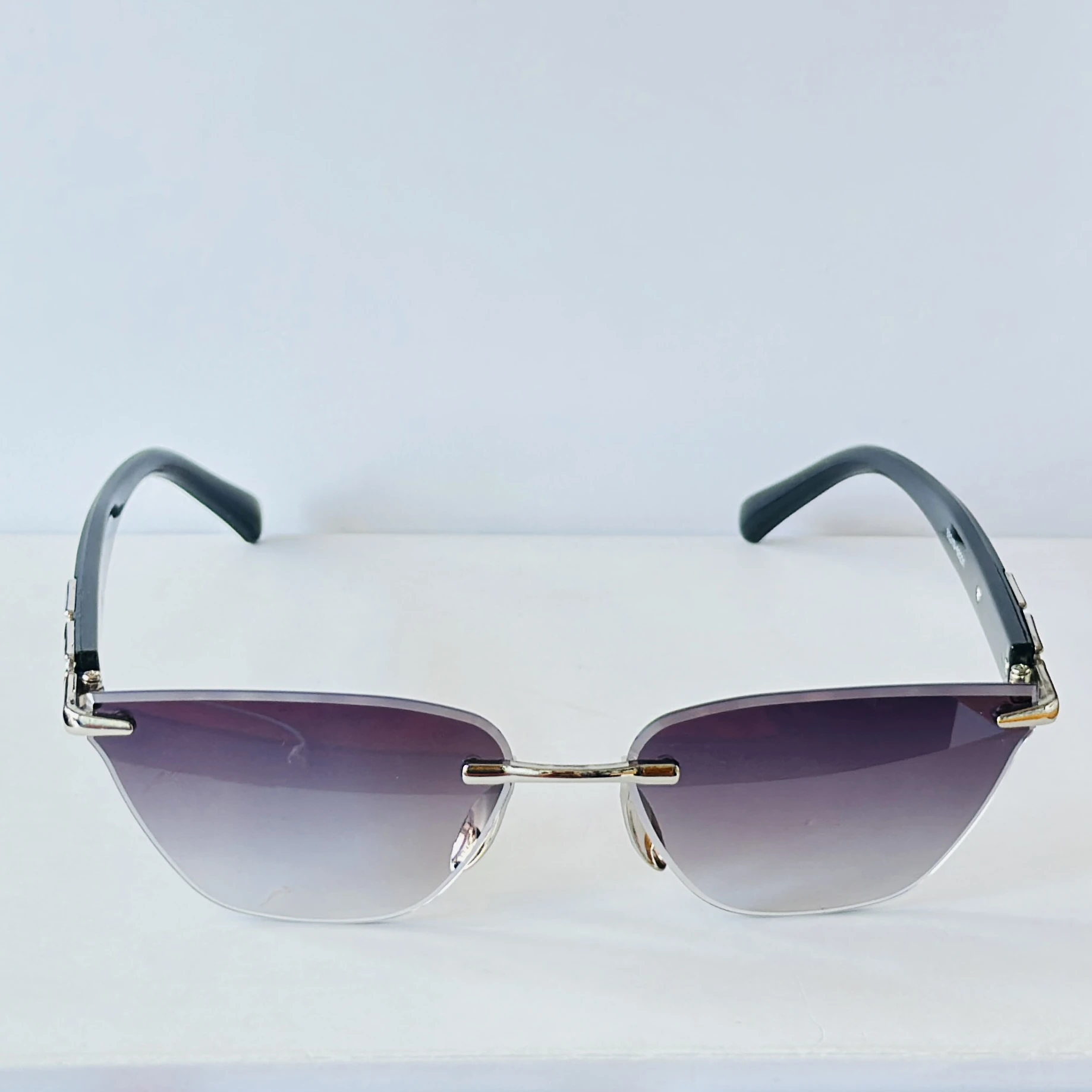Rimless cat-eye sunglasses
