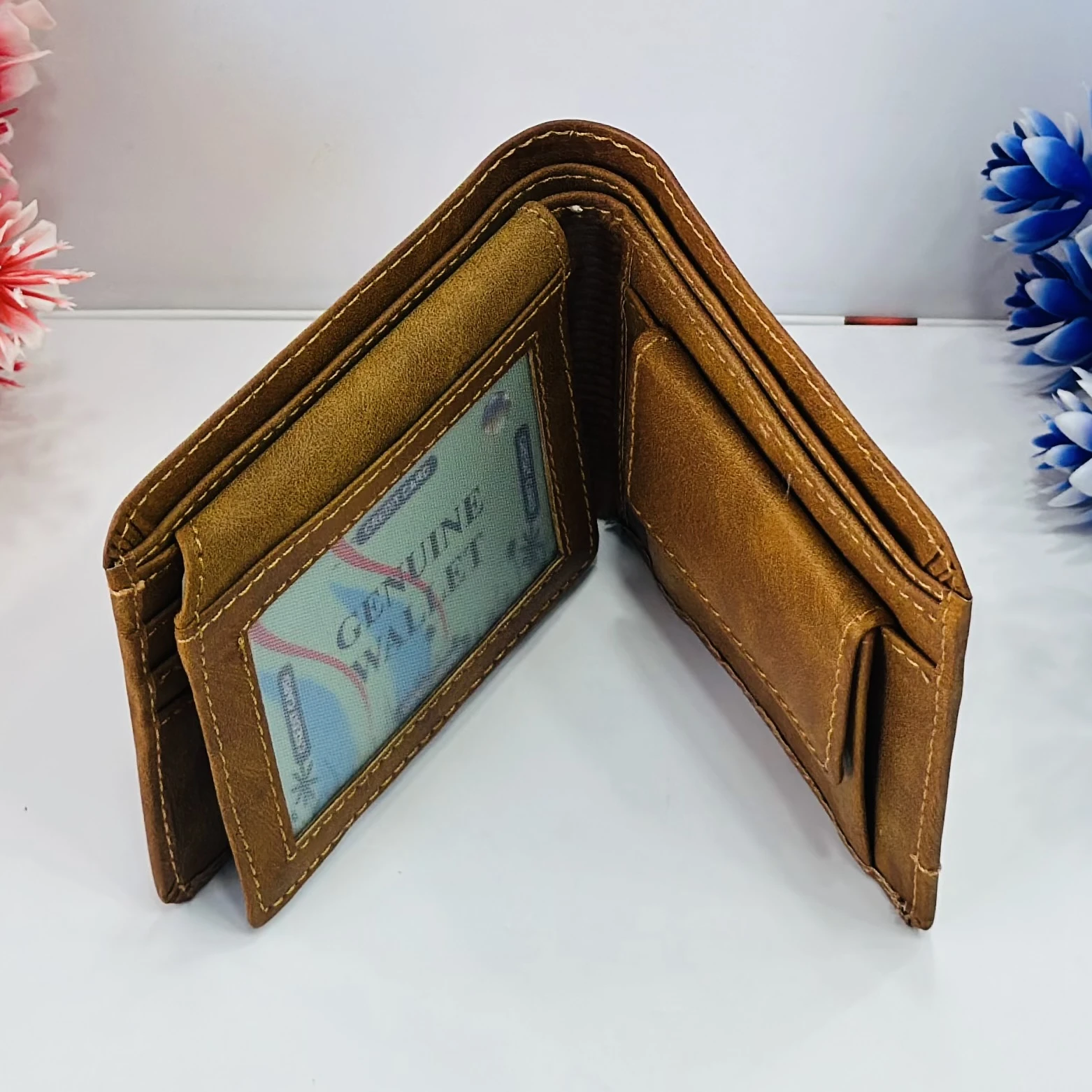 Brown bifold leather wallet in a Montblanc gift box.