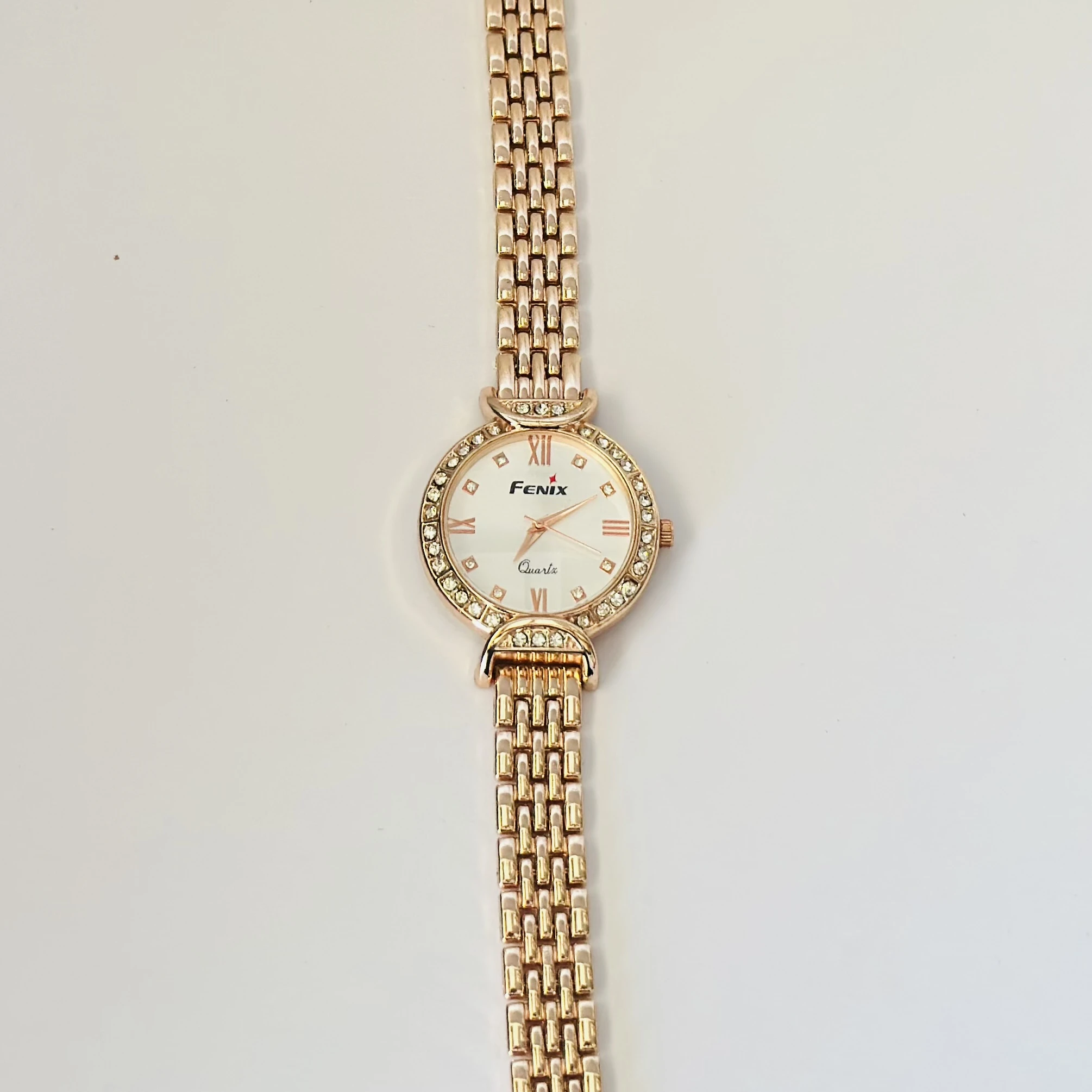 Women’s rose gold-tone quartz watch