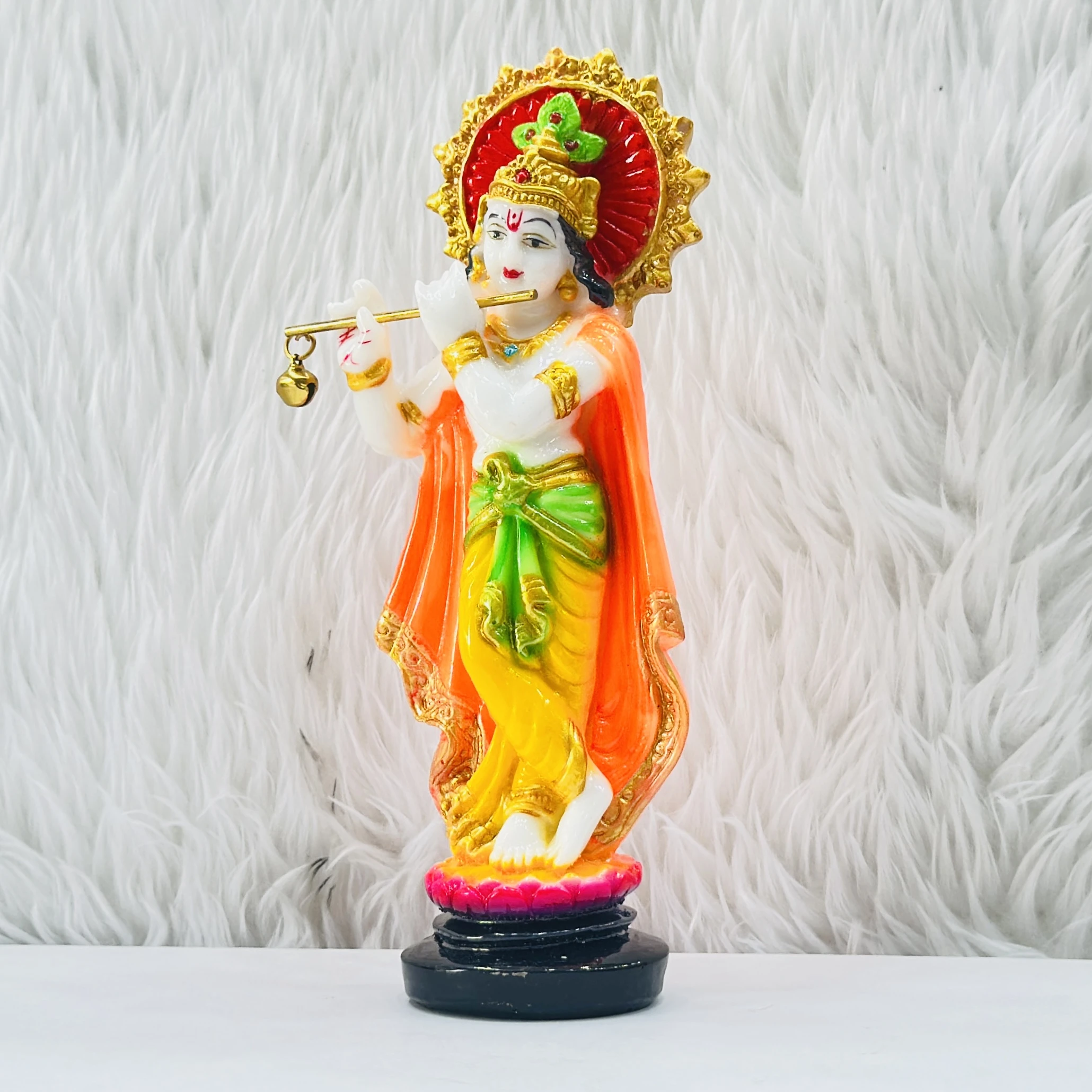 polyresin Krishna idol is a beautiful decorative showpiece