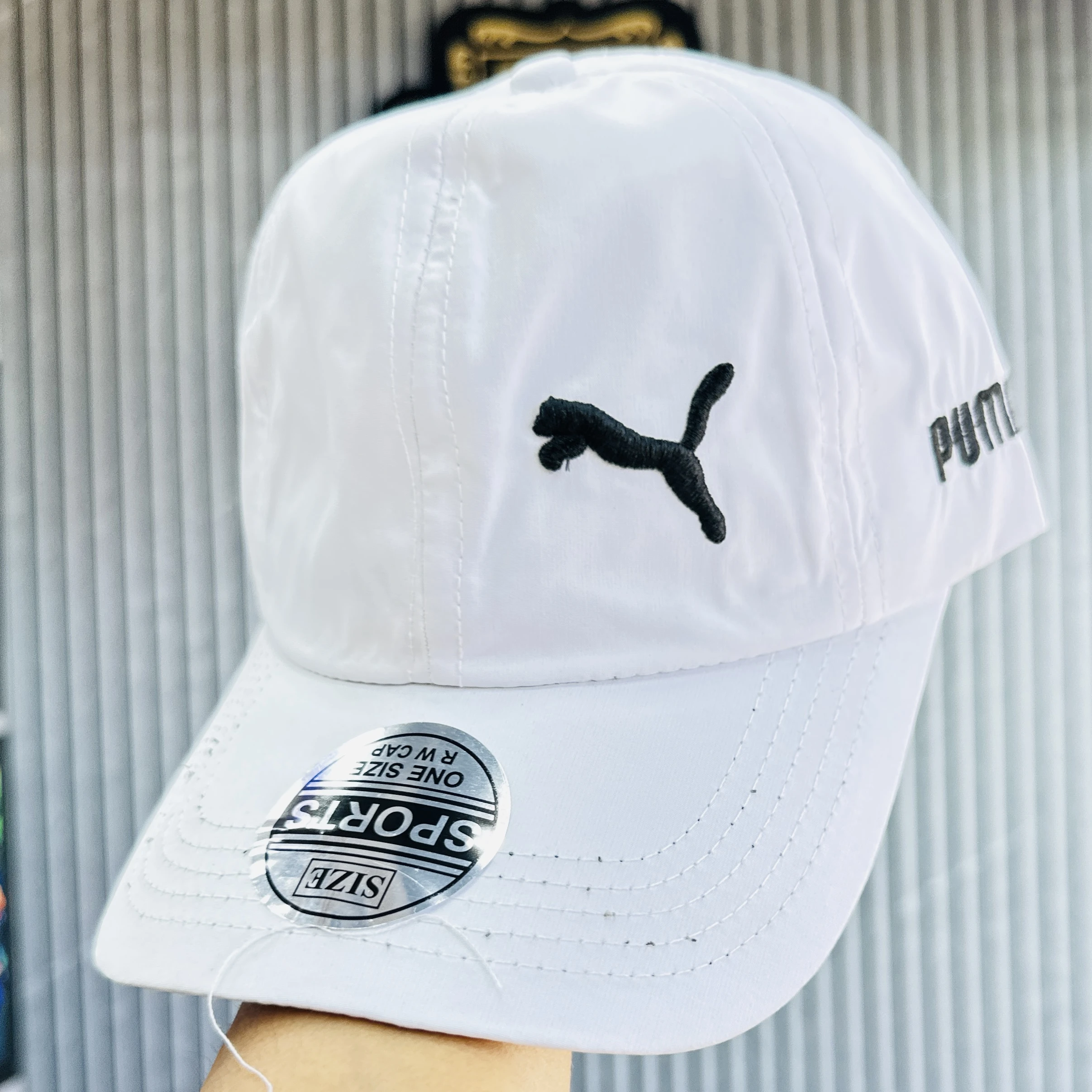 white baseball cap