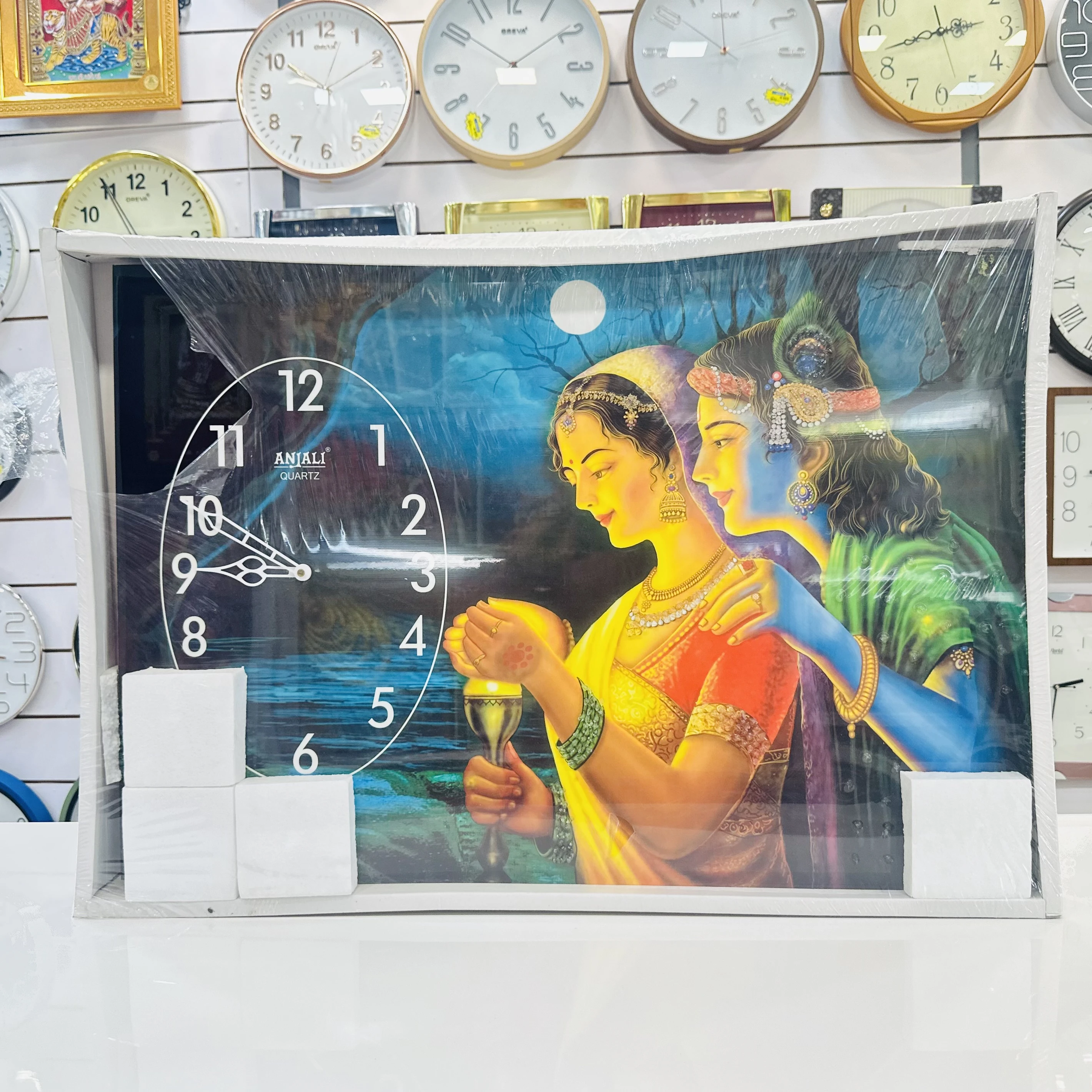 Radhe Krishna-themed wall clock(SKU-3PZG5P)