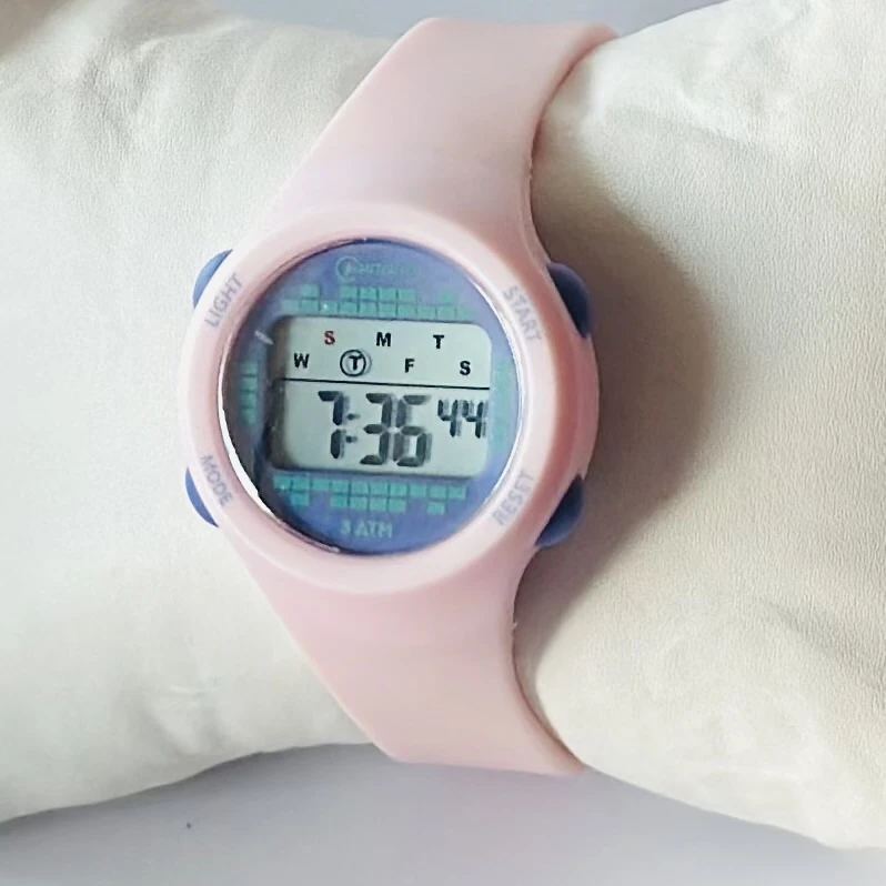 Mingrui 8212L Tennger Lady sport digital watch with a pink silicone strap.
