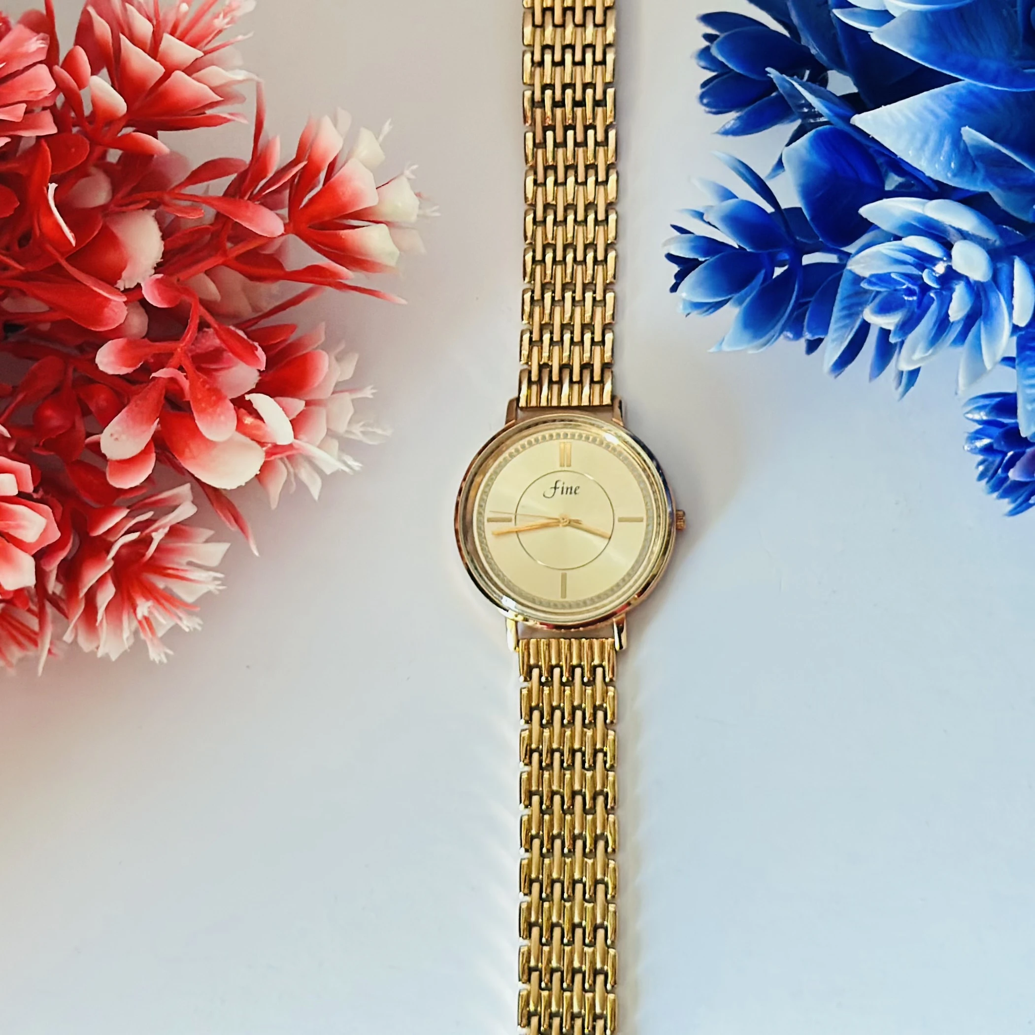 Gold plated quartz watch.