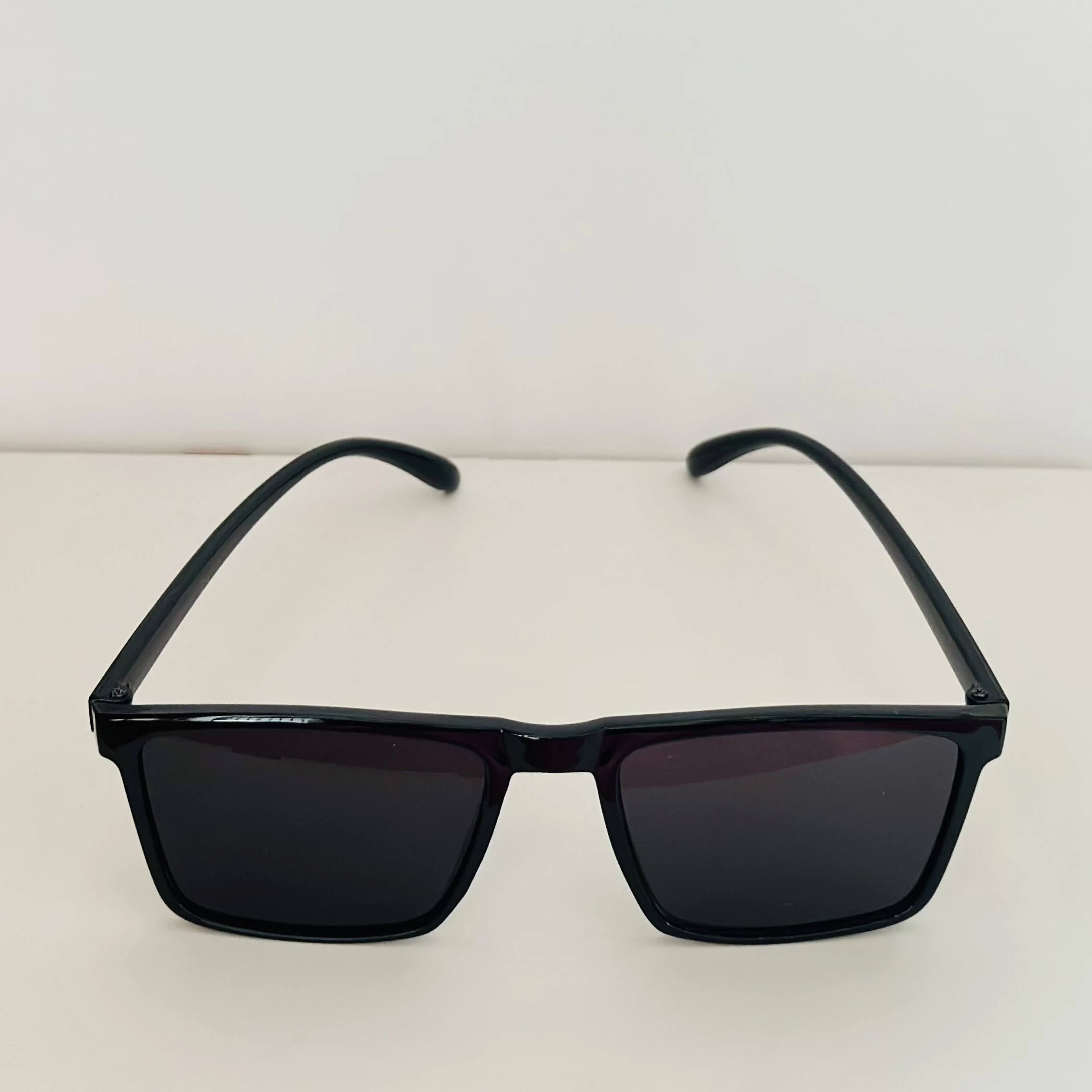 Tommy Hilfiger TH 2077/S sunglasses in black with carbon fiber temples.