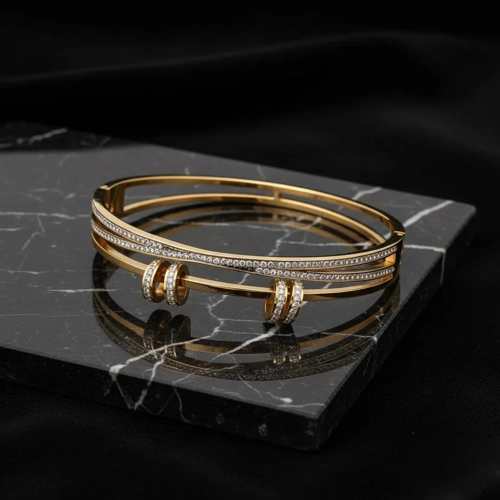 Gold toned multi-strand cuff bracelet