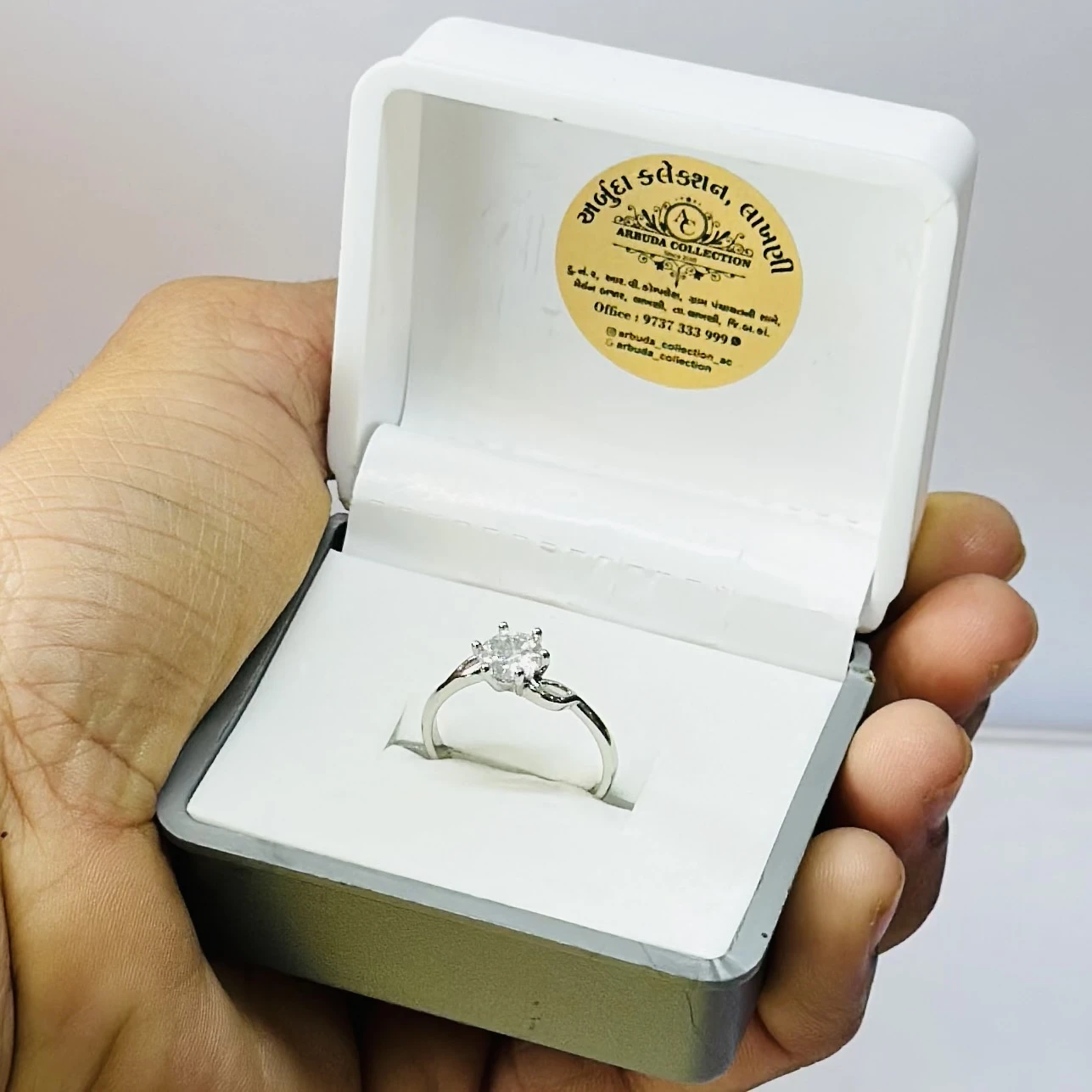 Zavya twisted solitaire rhodium plated 925 sterling silver ring.