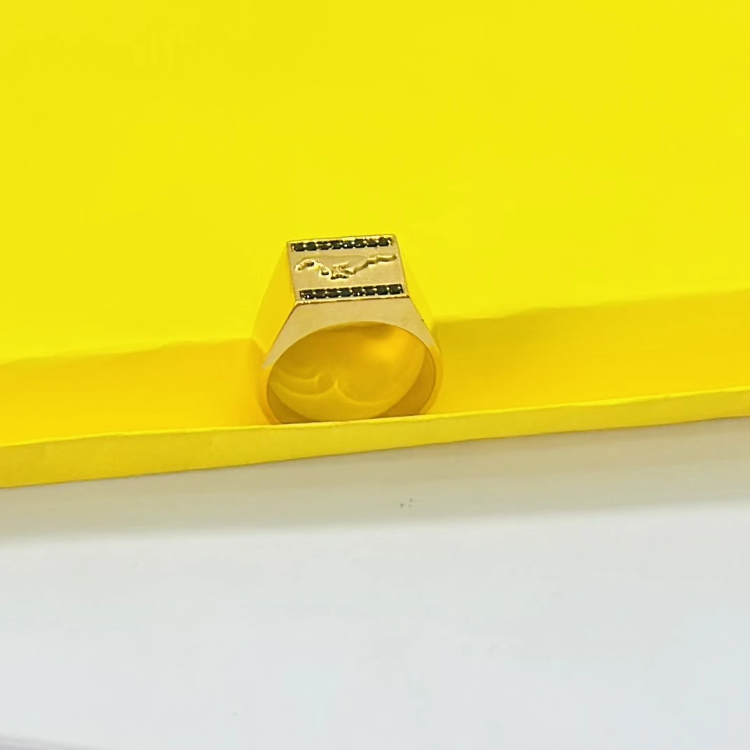 Gold colored Ford Mustang men's ring featuring the running horse logo.