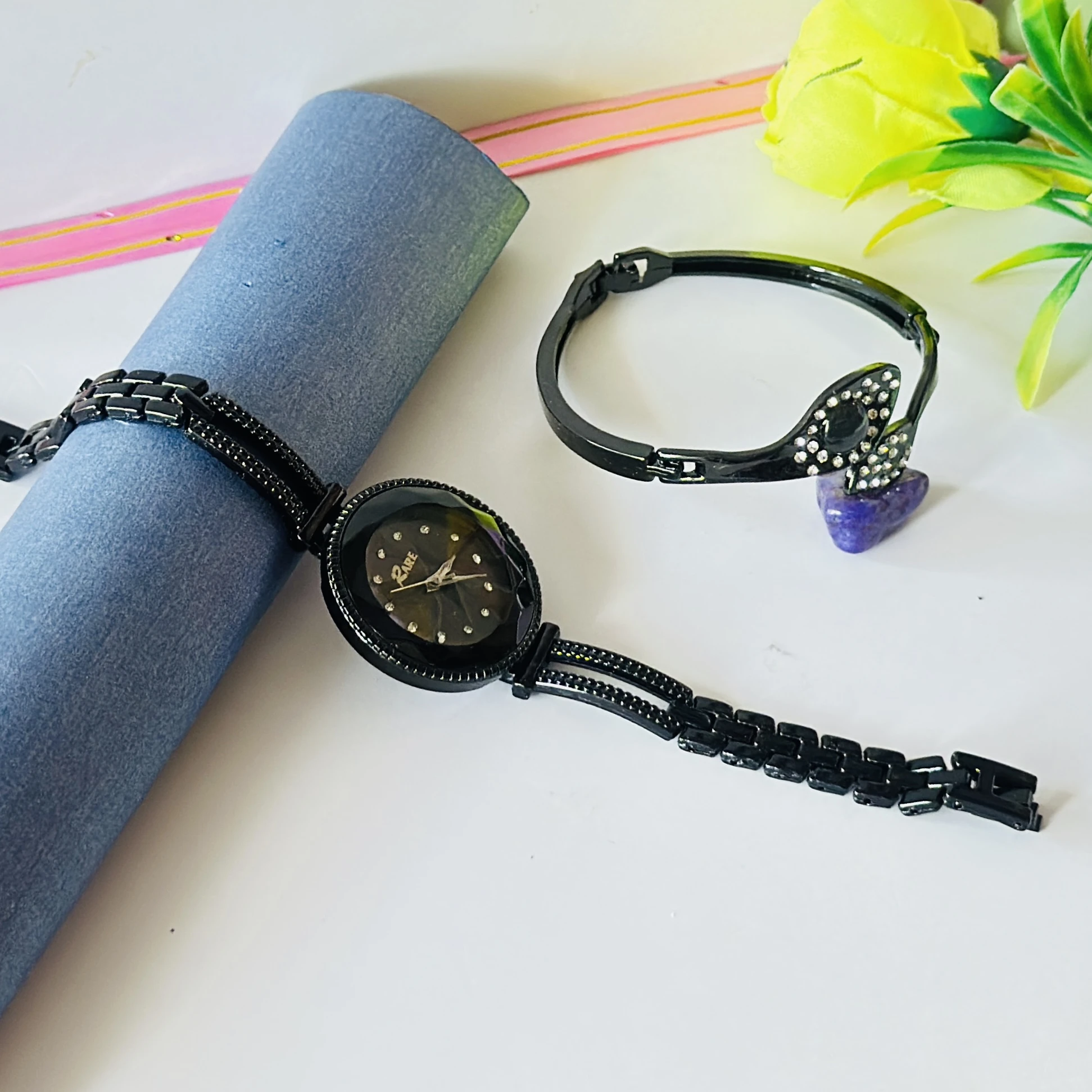 Black metal analog wristwatch and matching studded bracelet combo set