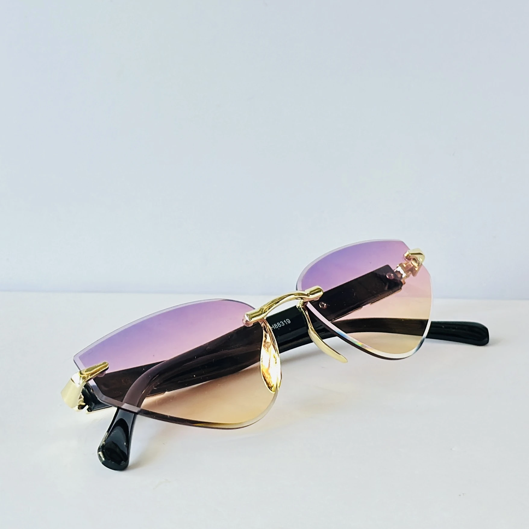 Rimless cat-eye sunglasses